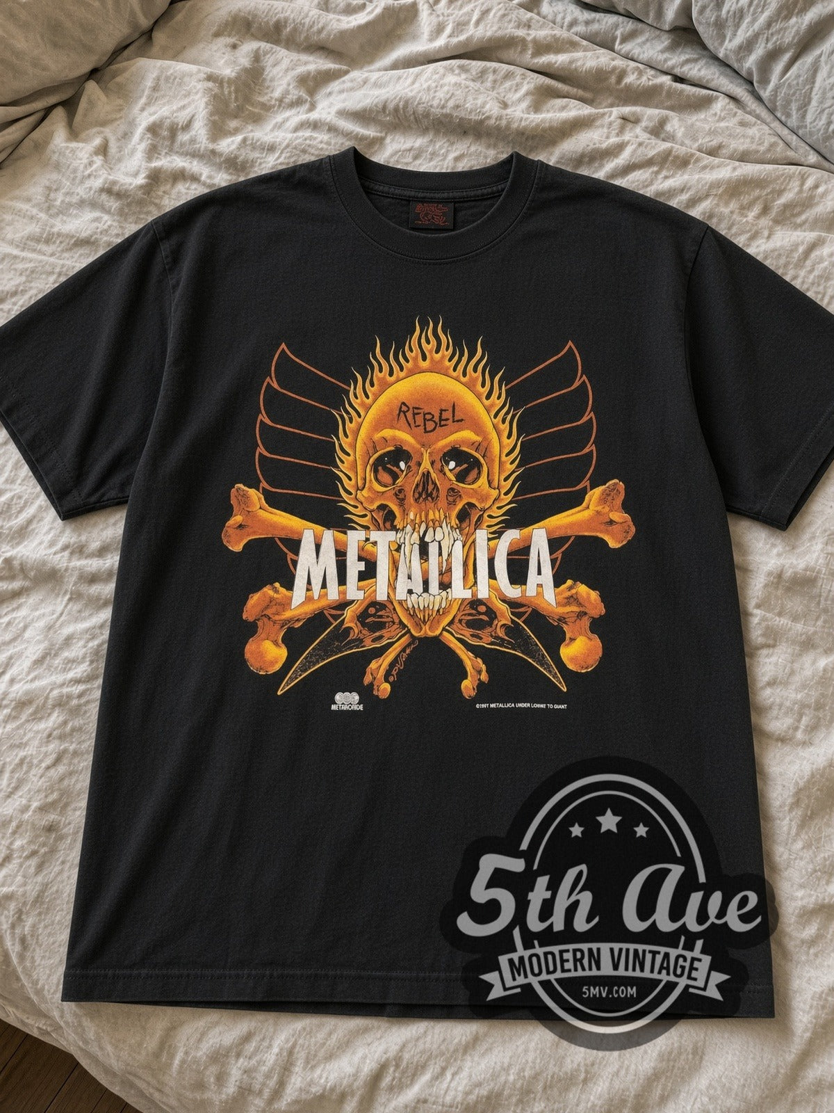 Black Metallica Rebel Flaming Skull & Yin-Yang Skulls 1997 tee laid flat on linen bed