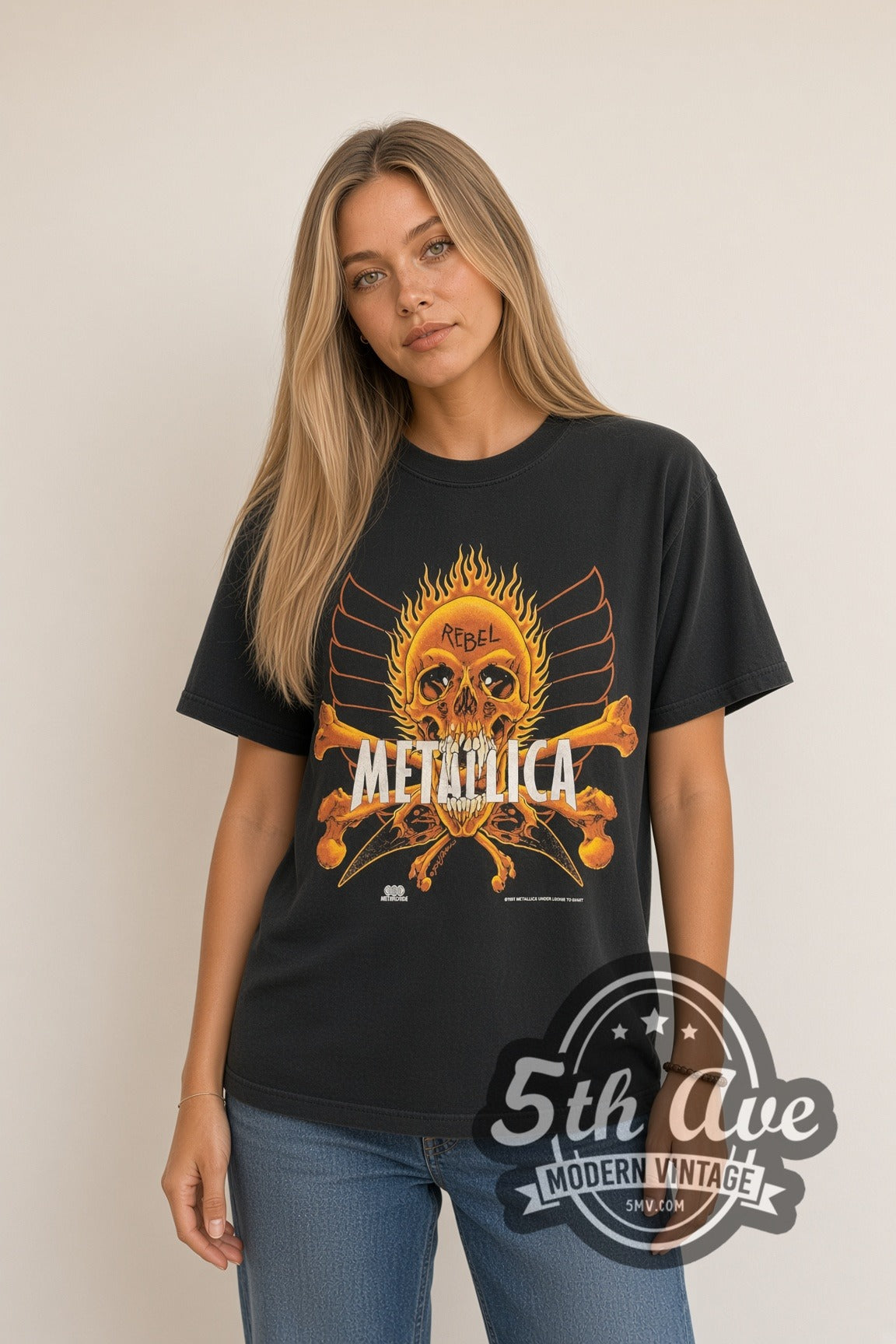 Woman wearing black Metallica Rebel Flaming Skull & Yin-Yang Skulls 1997 vintage band t-shirt
