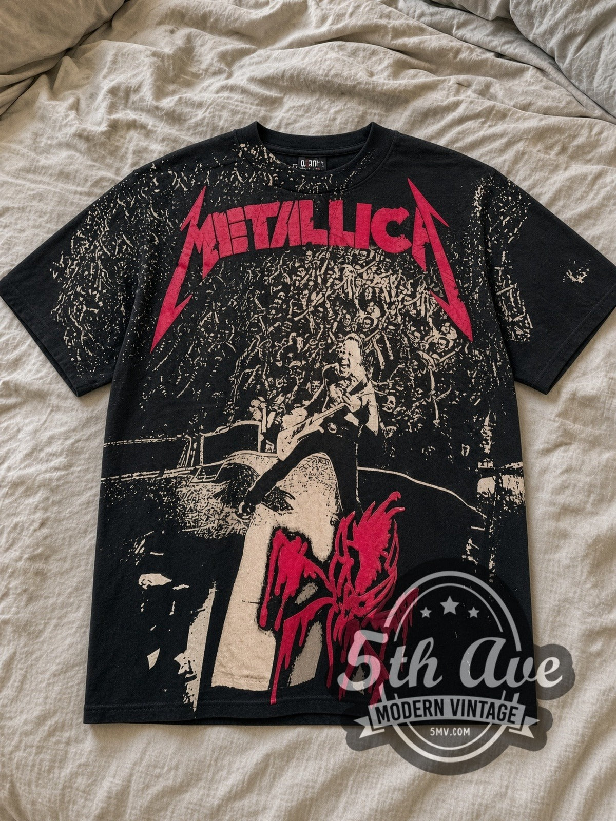 Black Metallica Stage Right All Over Print Vintage Band T-Shirt laid flat on a linen bed