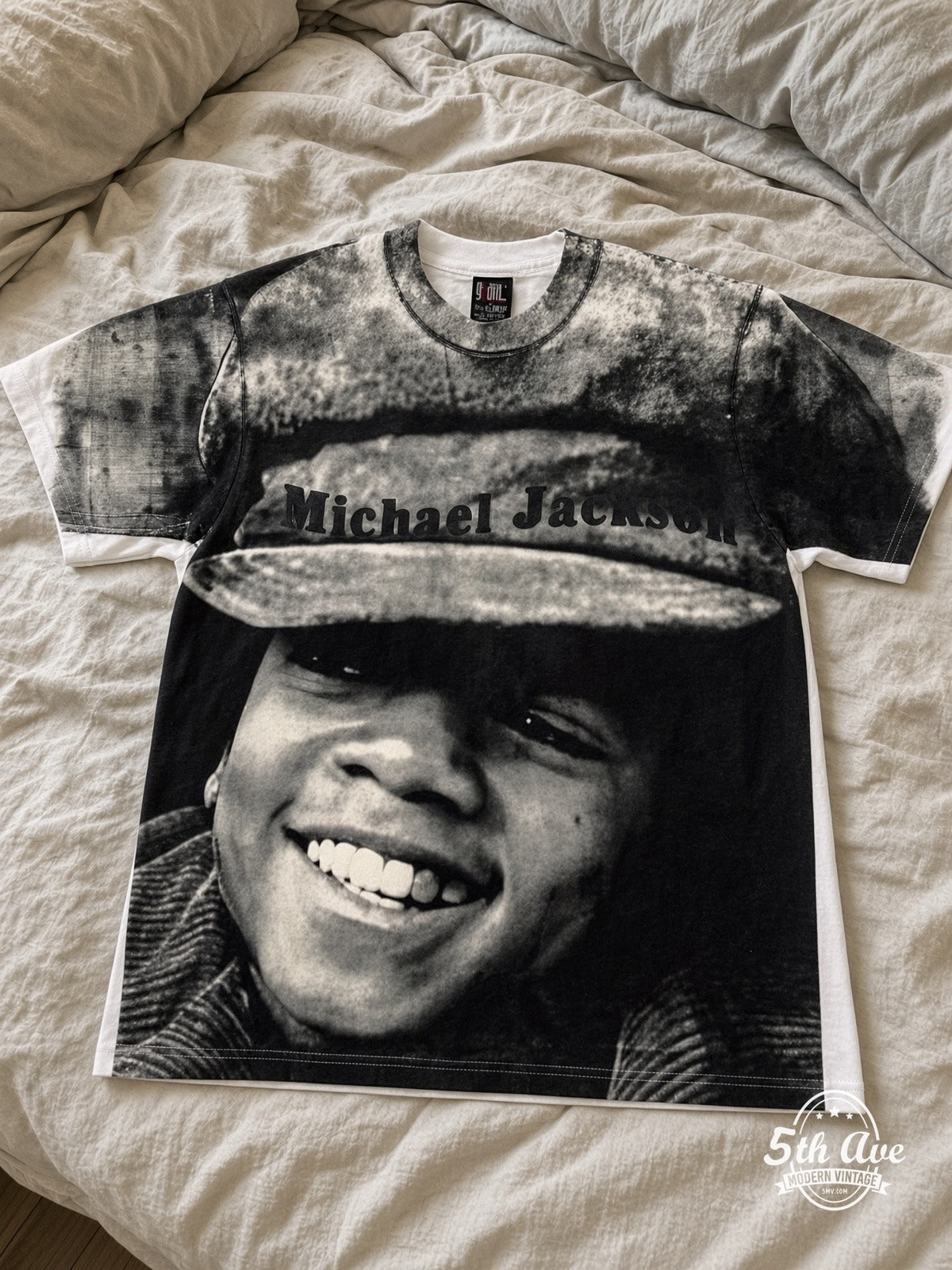Michael Jackson Hat Portrait White all over print vintage tee laid on bed