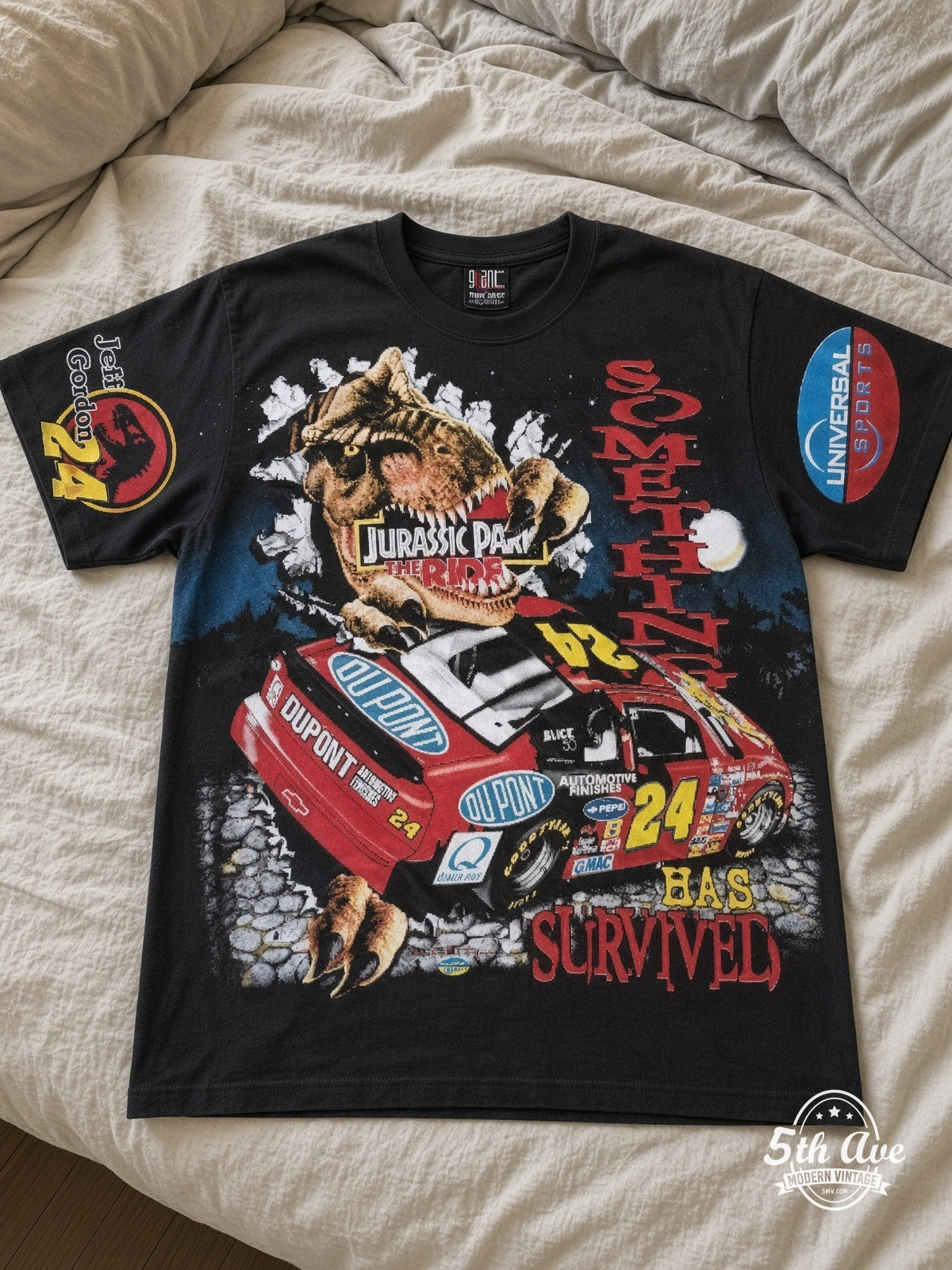 NASCAR Jeff Gordon 24 Jurassic Park The Ride vintage tee laid on bed