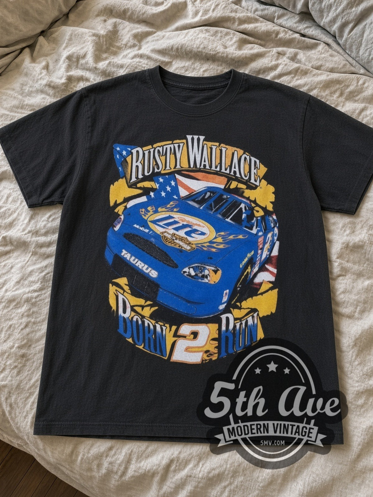 NASCAR Rusty Wallace Miller Lite Born 2 Run nascar tee in black laid flat on a bed, front artwork