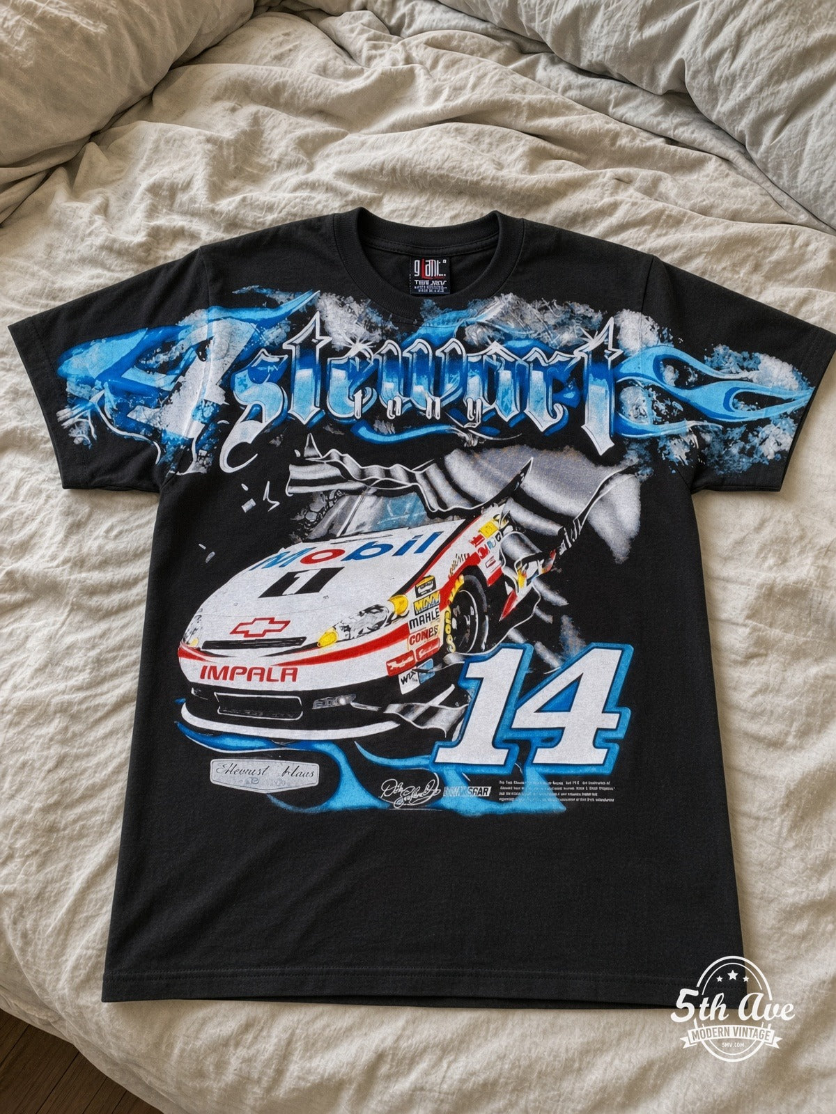 NASCAR Tony Stewart 14 Mobil 1 vintage tee laid on bed