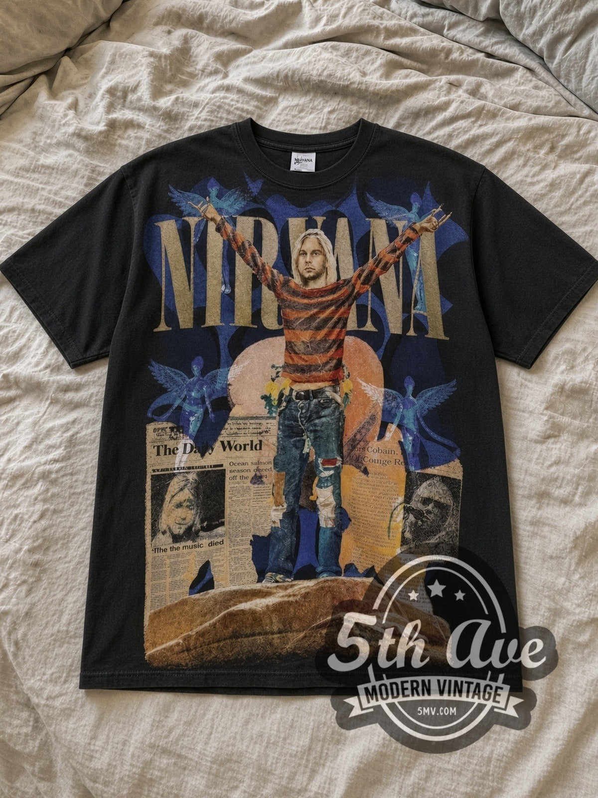 Black Nirvana Kurt Cobain Overprint Vintage Band T-Shirt laid flat on a linen bed