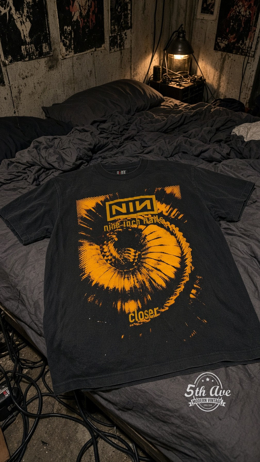 Nine Inch Nails vintage band t-shirt on bed