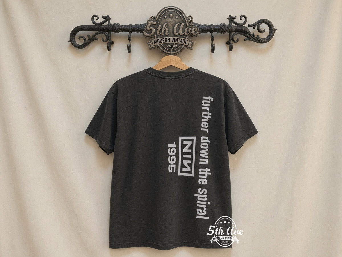 Nine Inch Nails Black Distressed Crew Neck T-Shirt: Embodying Industrial Rock Style vintage tee on 5th Ave cream rack — back