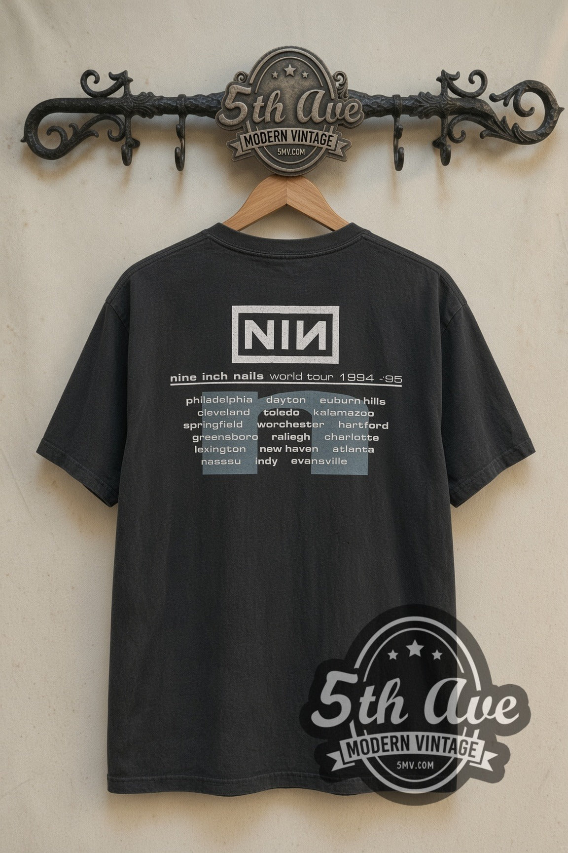 NIN band t-shirt back with logo and 1994-95 world tour dates on cream 5th Ave rack