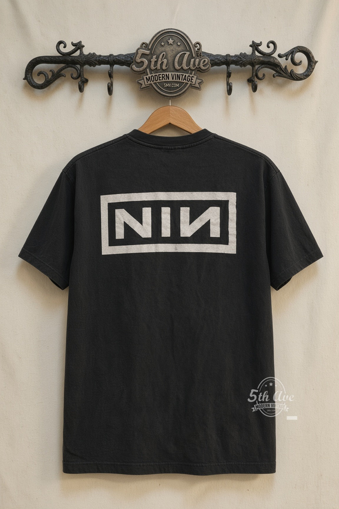 Nine Inch Nails Kneeling Figure NIN Logo vintage band t-shirt back on cream 5th Ave rack