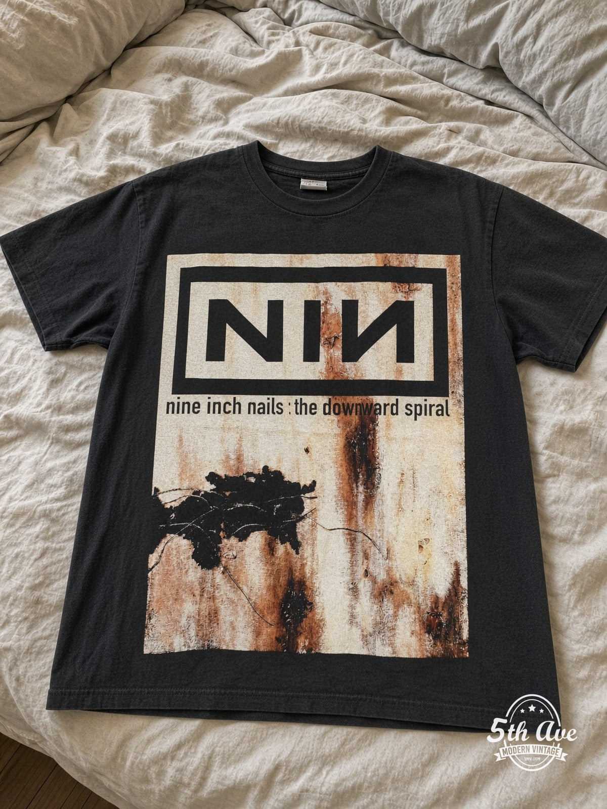 Nine Inch Nails The Downward Spiral Nothing Records vintage tee laid on bed