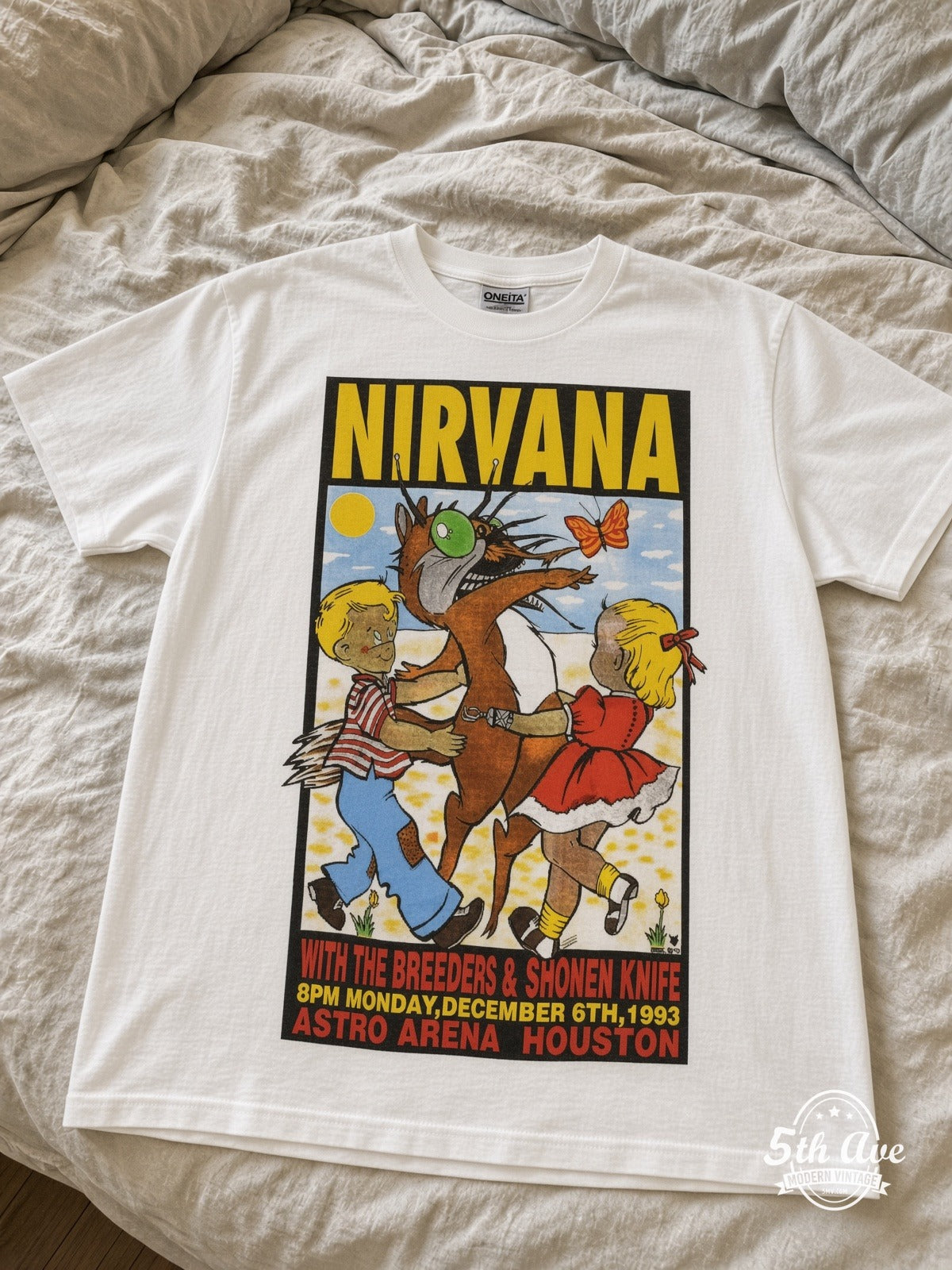 Nirvana Astro Arena Houston Dec 6 1993 vintage tee laid on bed