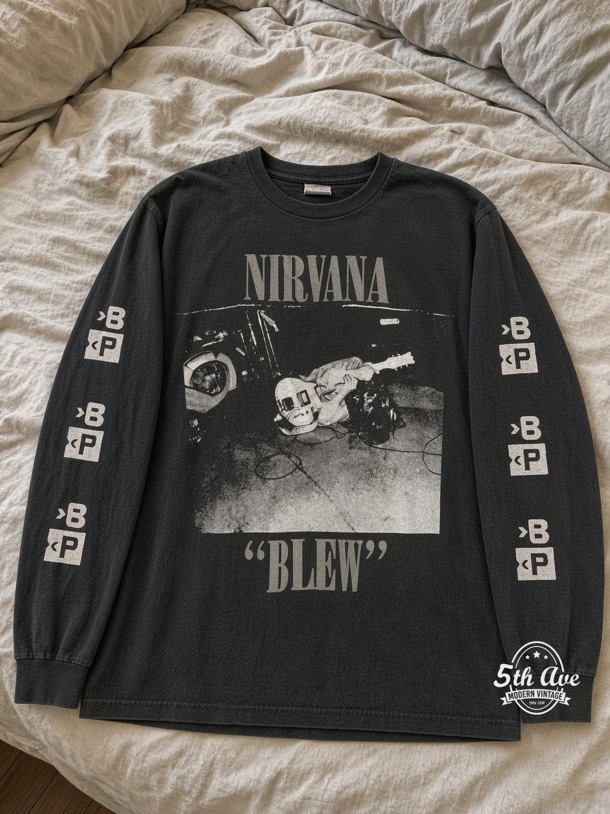 Nirvana Blew Kurt Stage Floor Sub Pop LS vintage tee laid on bed