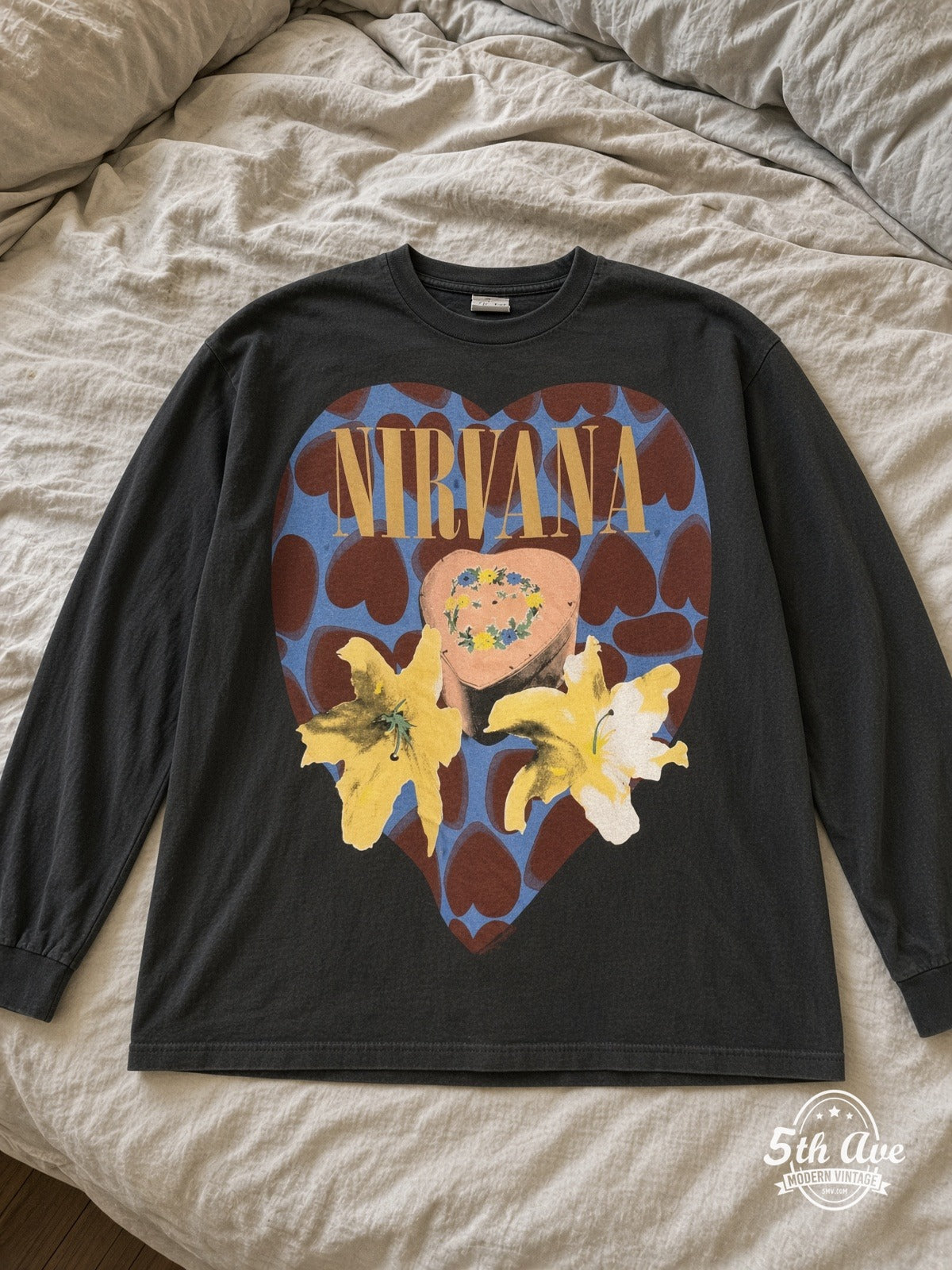 Nirvana Heart Lilies In Utero vintage tee laid on bed
