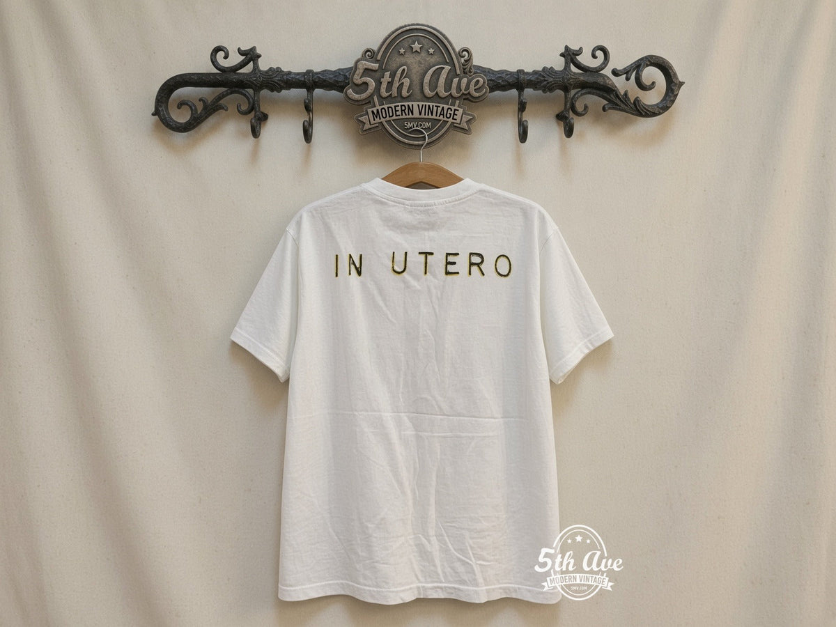Nirvana 'In Utero' Angel T-Shirt: A Timeless Tribute to Iconic Music vintage tee on 5th Ave cream rack — back