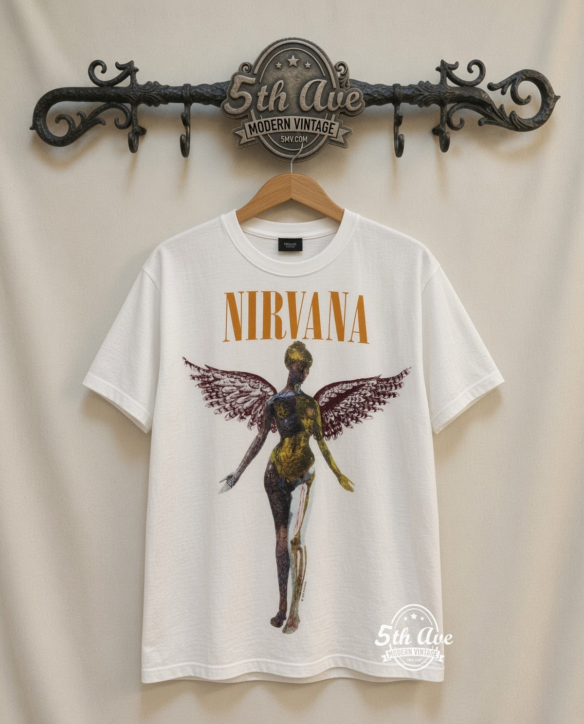 Nirvana 'In Utero' Angel T-Shirt: A Timeless Tribute to Iconic Music vintage tee on 5th Ave cream rack — front