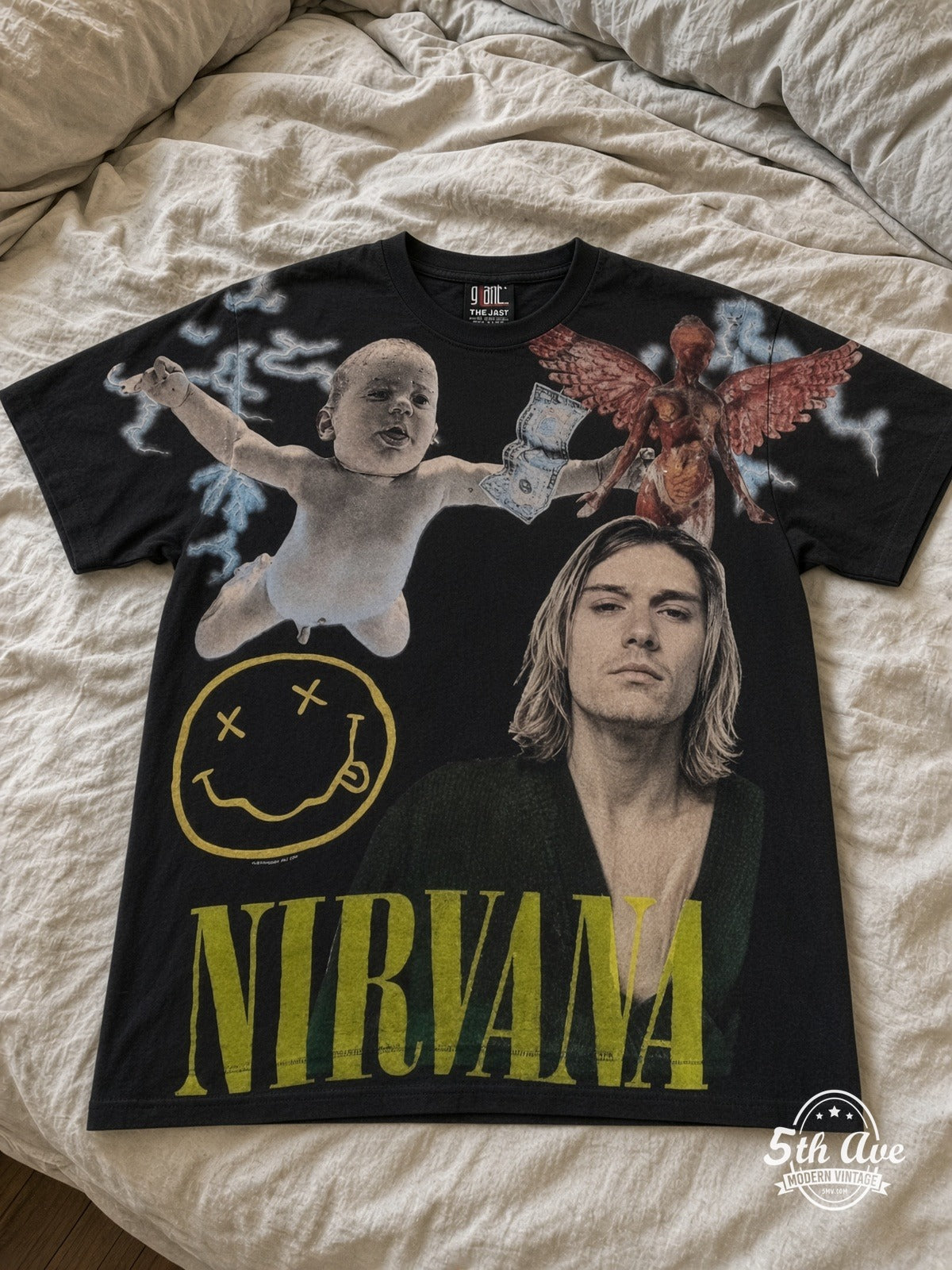 Nirvana In Utero Angel Smiley all over print vintage tee laid on bed