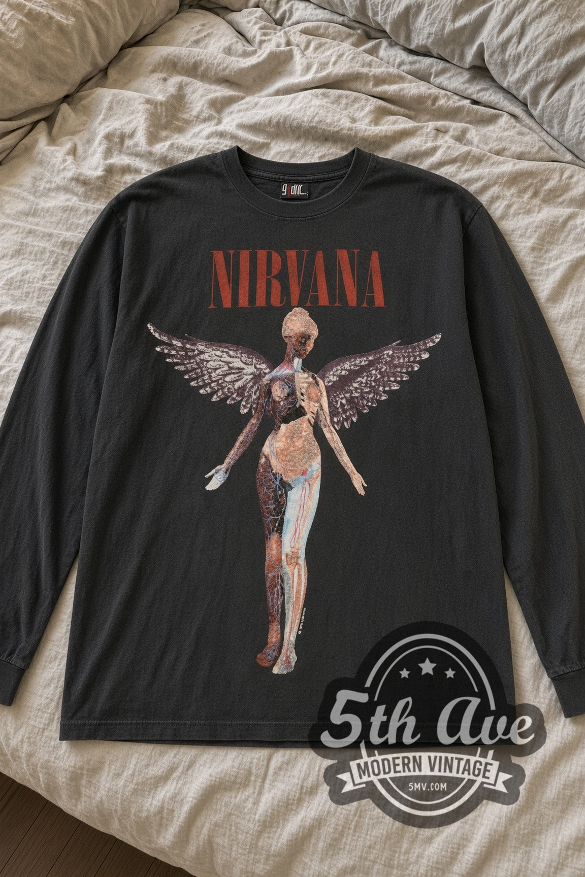 Nirvana In Utero Red Logo Angel Long Sleeve vintage band t-shirt laid flat on bed