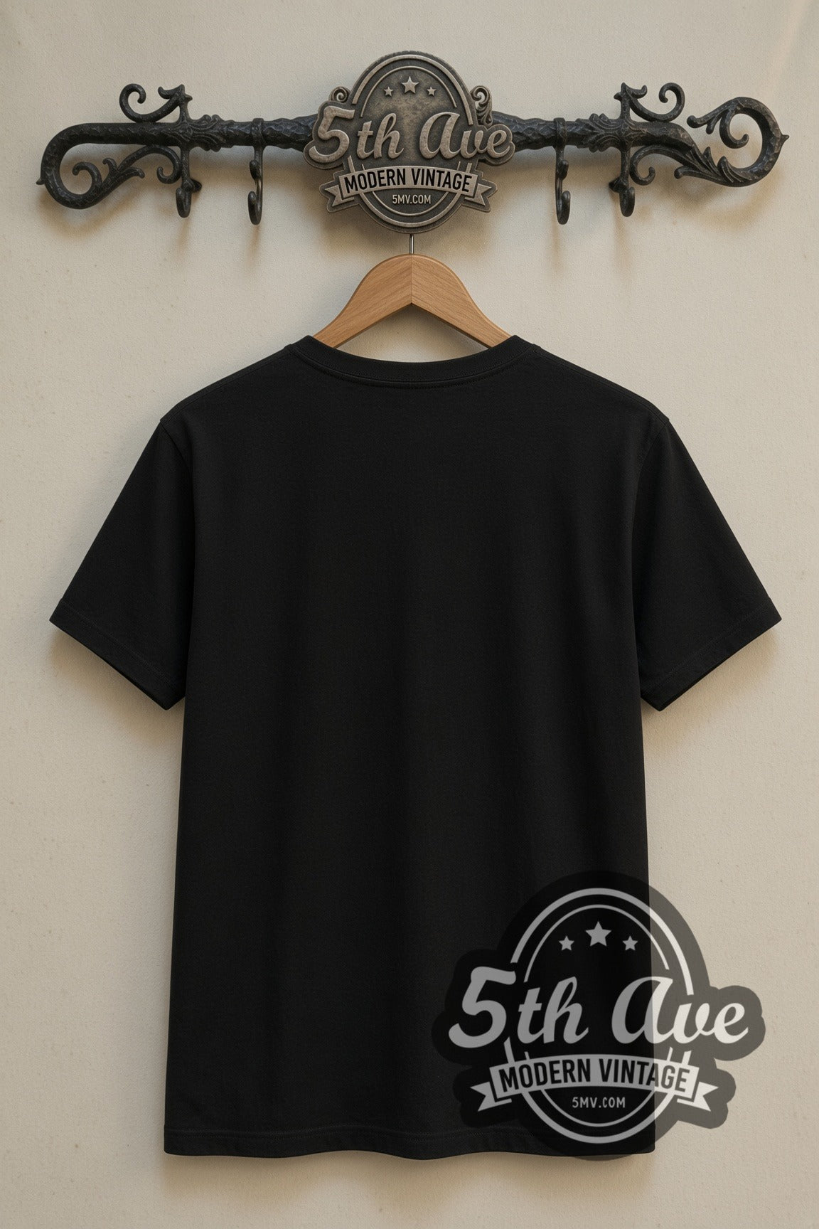 Plain black back of Nirvana Kurt Cobain In Utero Winged Guitar double stitched tee on rack