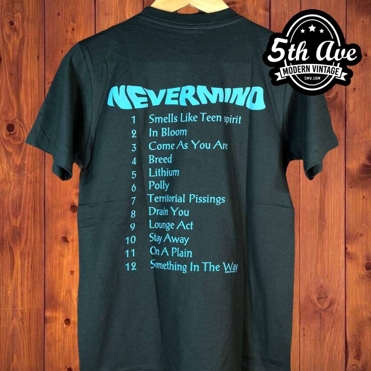 Nirvana 'Nevermind' Album Art Tee: A Distressed Tribute to a Grunge Masterpiece - Vintage Band Shirts