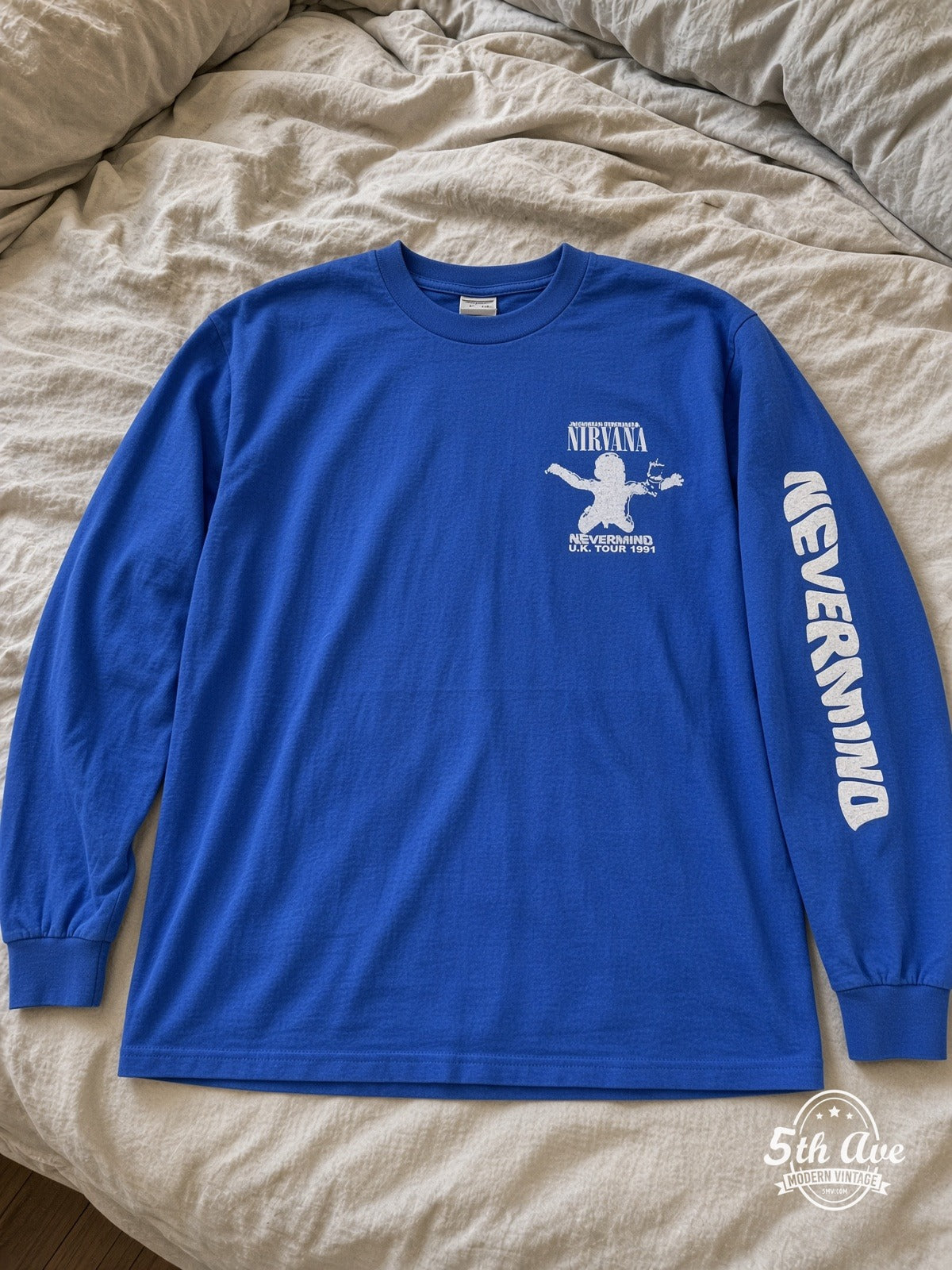 Nirvana Nevermind UK Tour 1991 vintage tee laid on bed