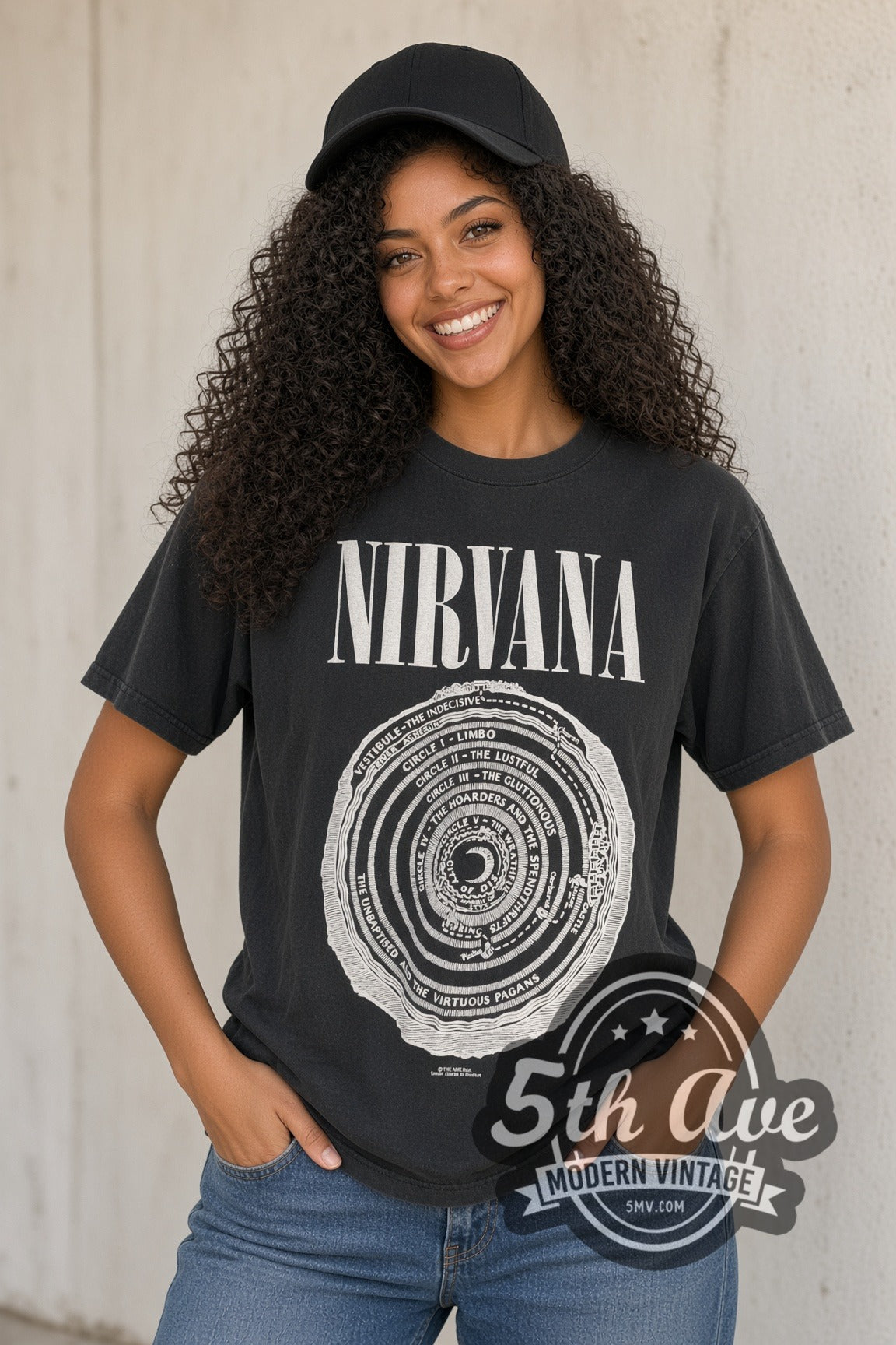 Woman wearing faded black Nirvana Vestibule Circles of Hell vintage band t-shirt