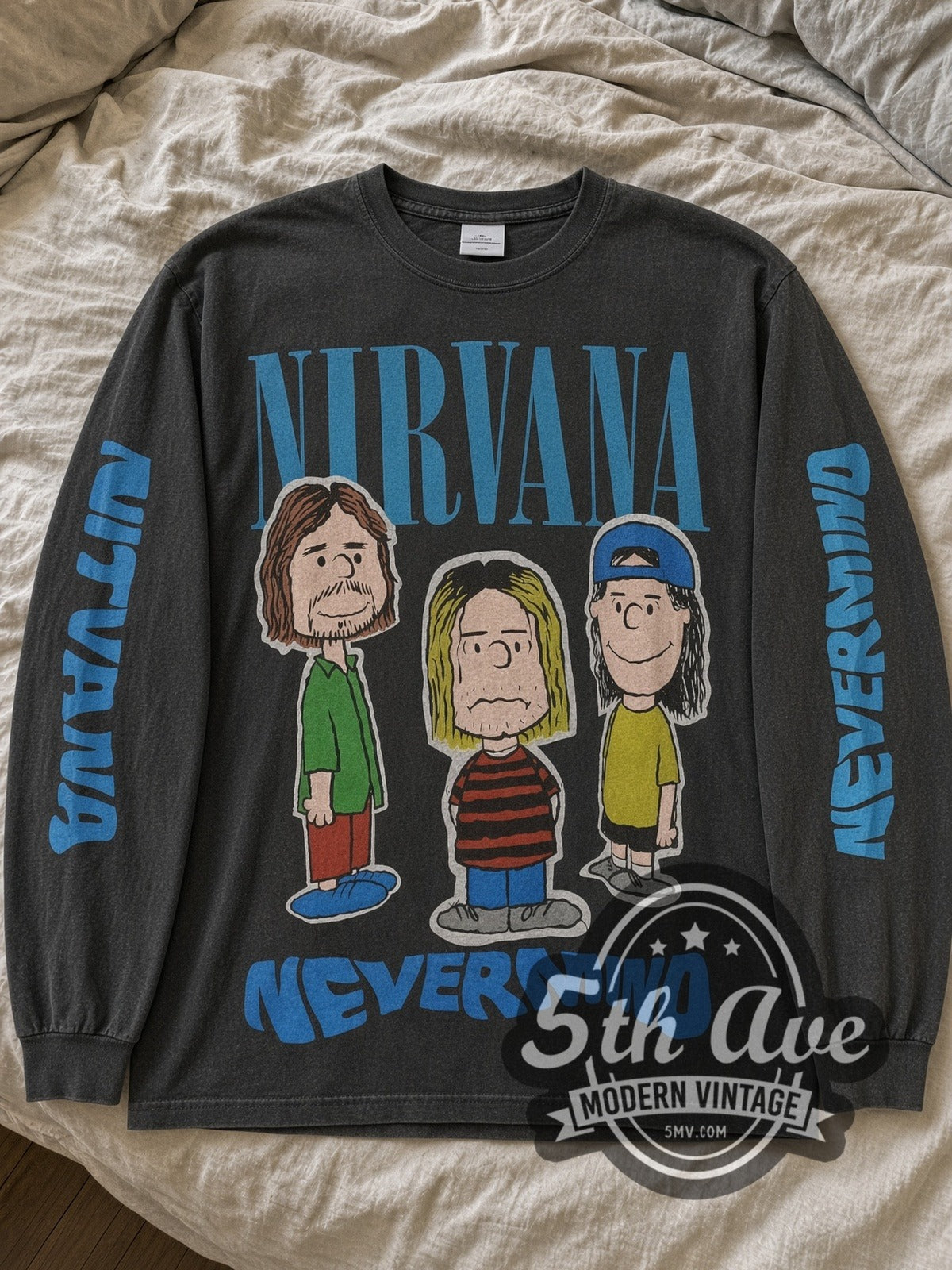 Faded Black Nirvana x Peanuts Nevermind Snoopy vintage band long sleeve tee laid flat on linen bed