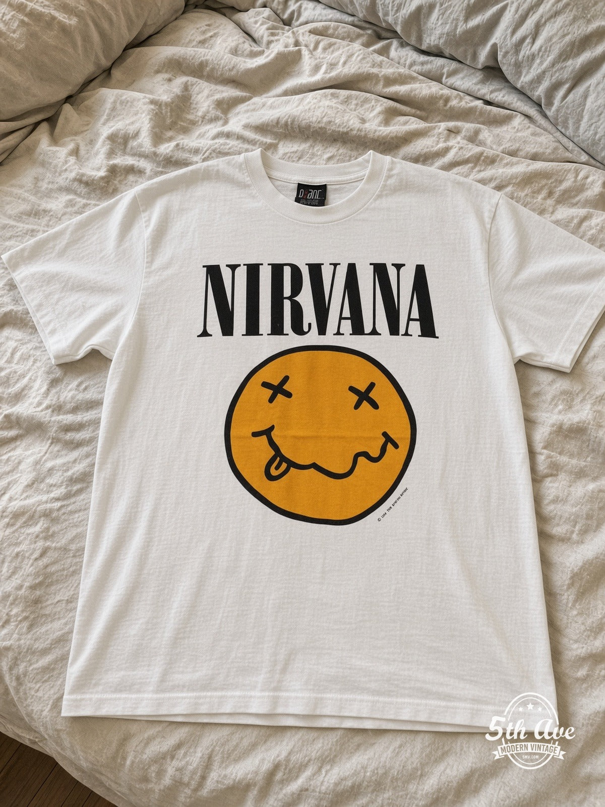 Nirvana Butthole Surfers Chokebore 1993-94 vintage tee laid on bed