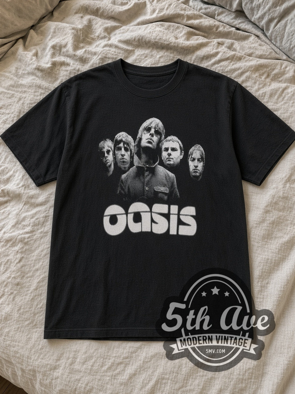 Black Oasis Liam Sunglasses Band Portrait White Logo Vintage Band T-Shirt laid flat on a linen bed