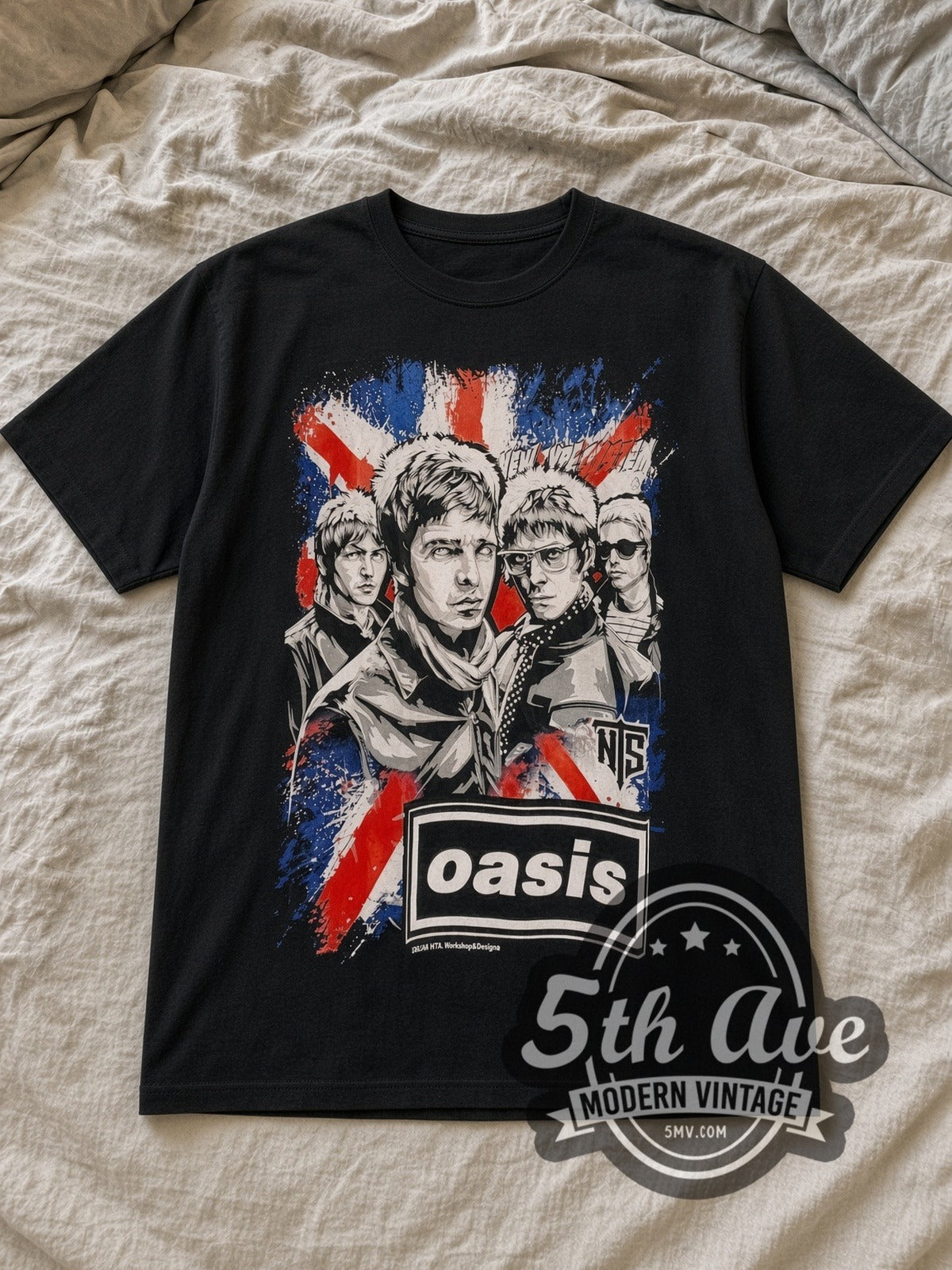 Black Oasis Union Jack NTS Band Illustration Vintage Band T-Shirt laid flat on a linen bed