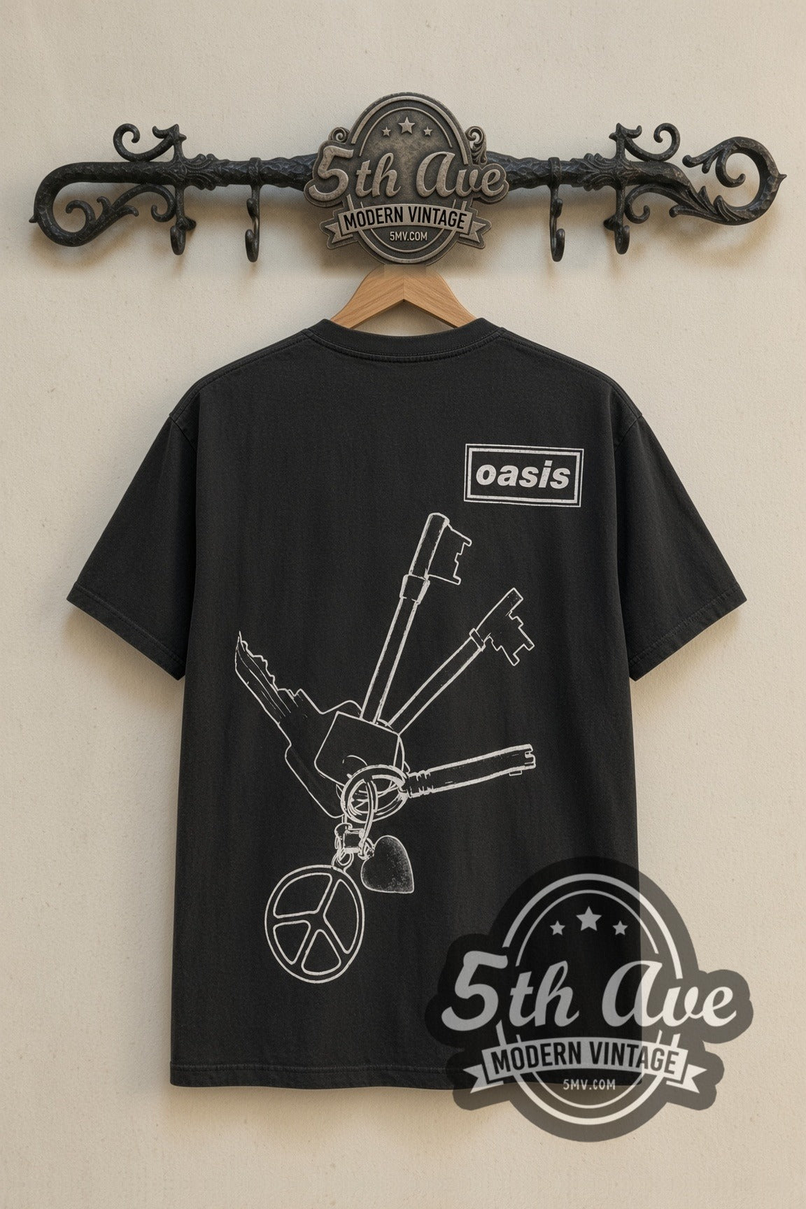 Back print of Oasis Liam Face & Keys tee on 5th Ave rack