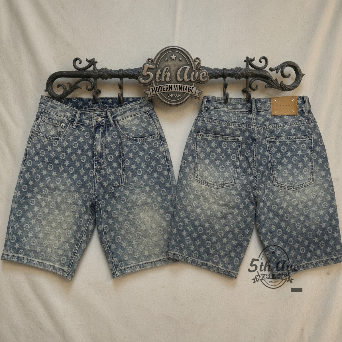 Dirty Wash Star Monogram Jorts front and back on rack