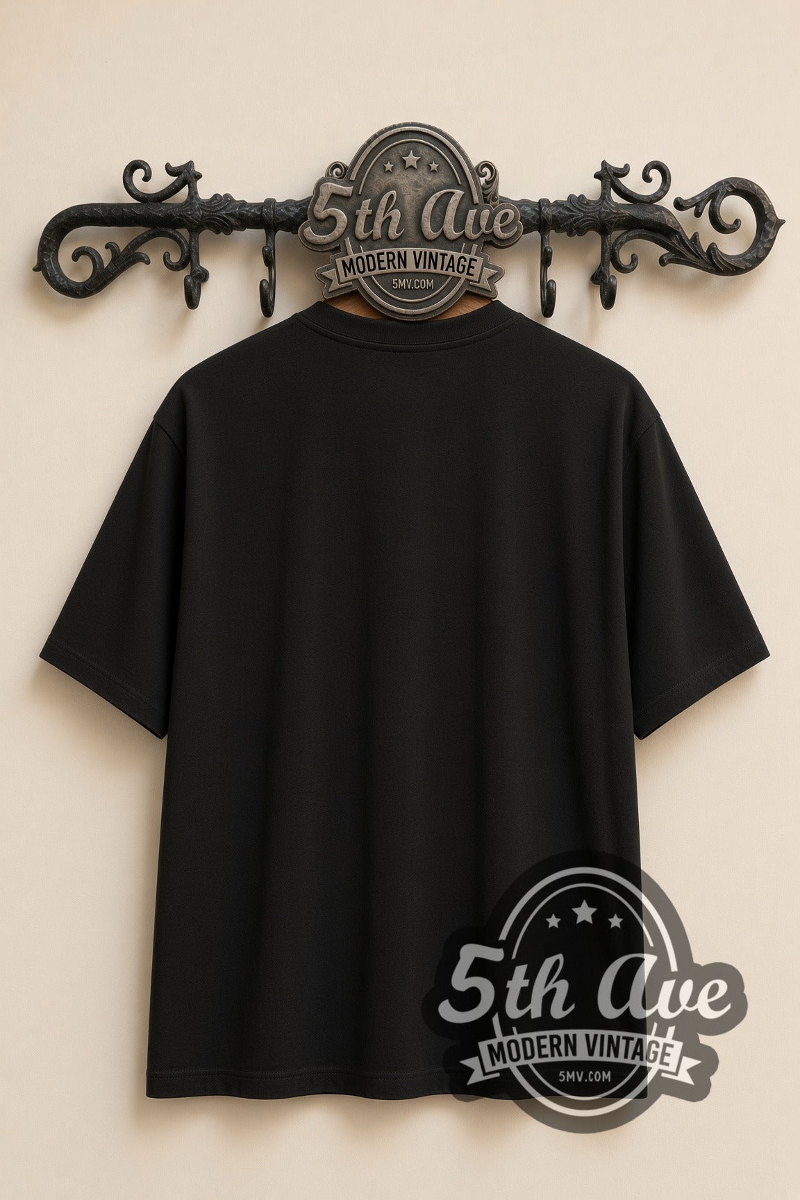 Plain black back of Pantera Ram Skull and Snakes Gold Crest double stitched tee on rack
