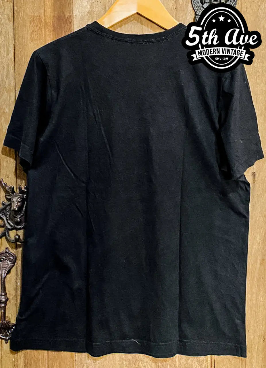 Snoop Dogg - New vintage t-shirt laid on bed