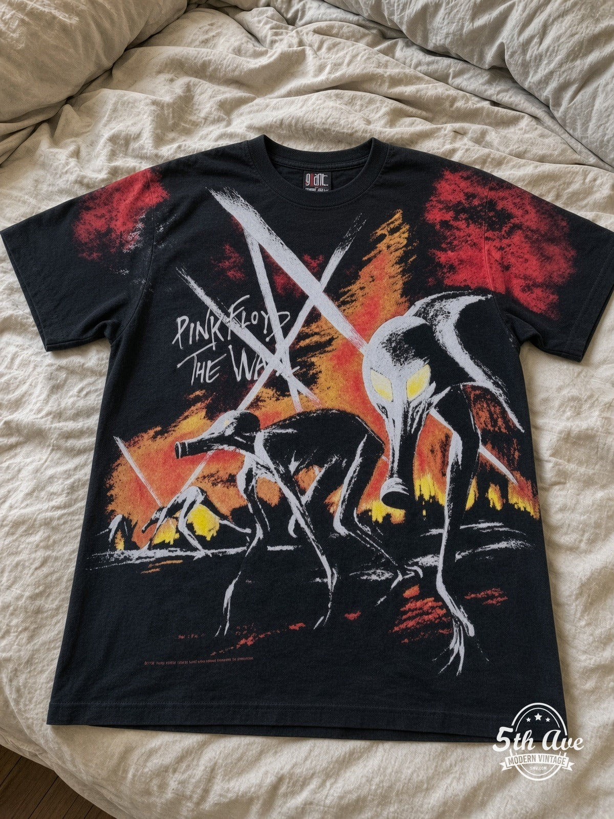Pink Floyd The Wall Hammers all over print vintage tee laid on bed