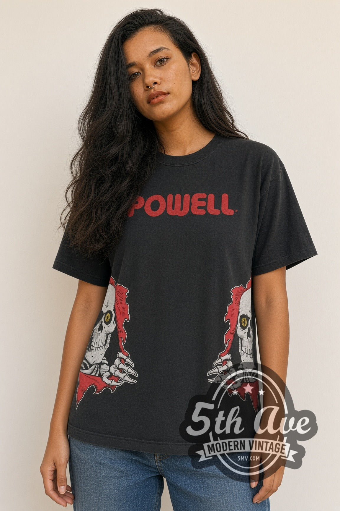 Woman wearing Powell Peralta Ripper skull side print vintage graphic tee