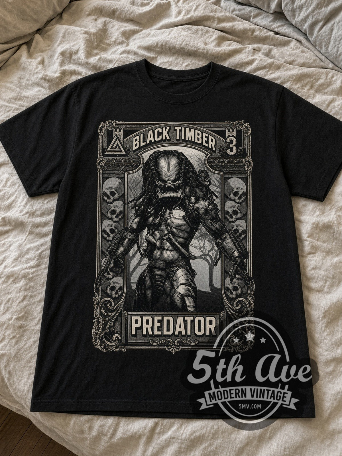 Predator Black Timber Frame Full Body black graphic tee laid flat on linen bed