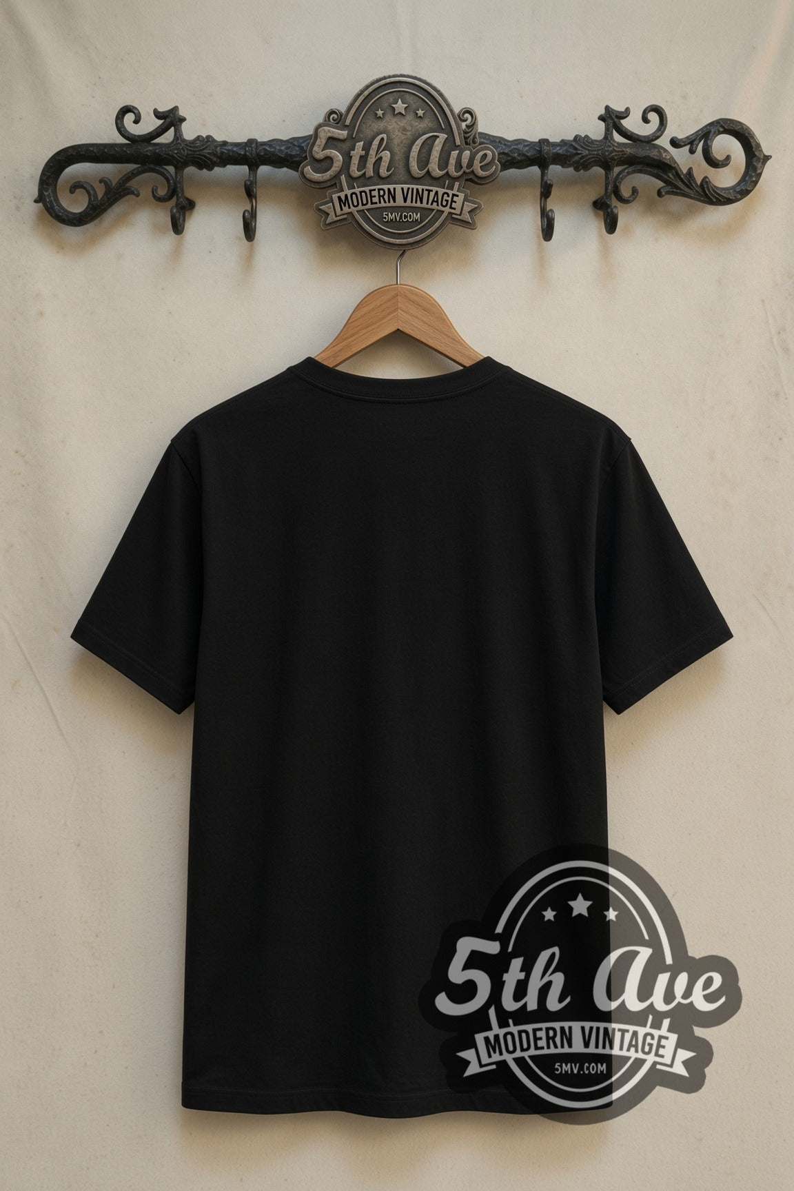 Plain black back of Predator face double stitched tee on rack