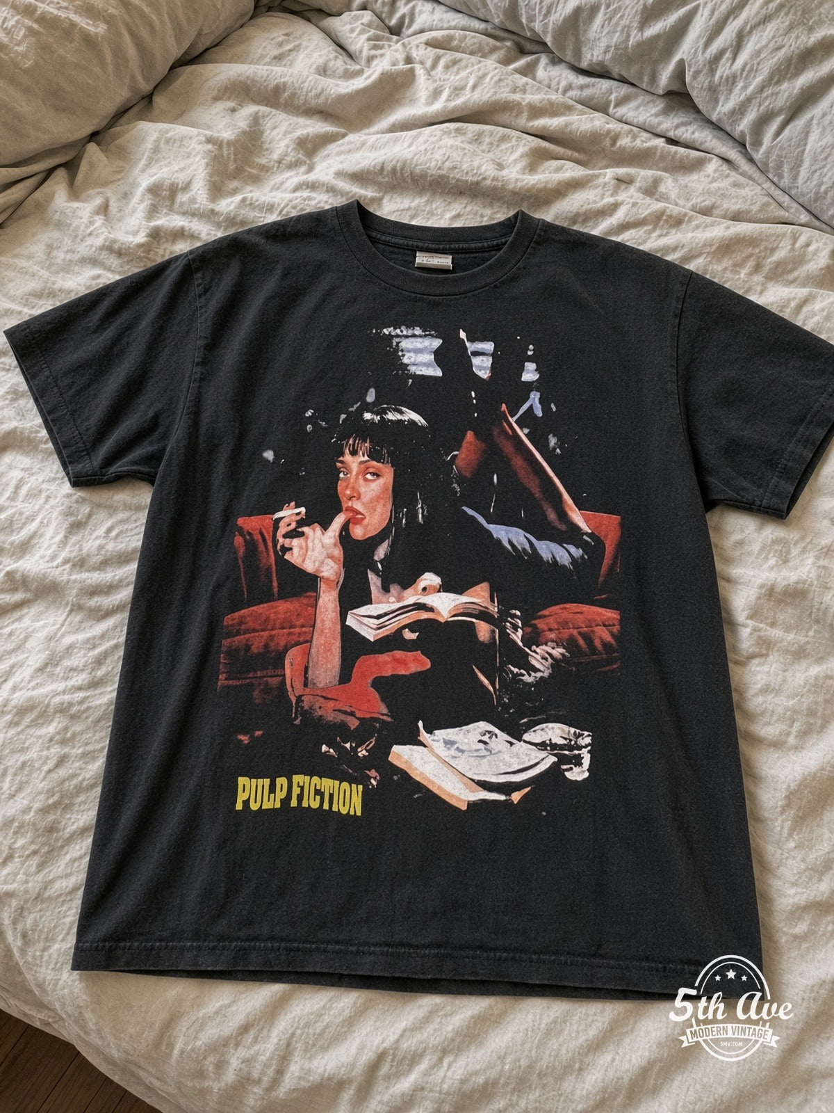 Pulp Fiction Mia Wallace Poster vintage tee laid on bed