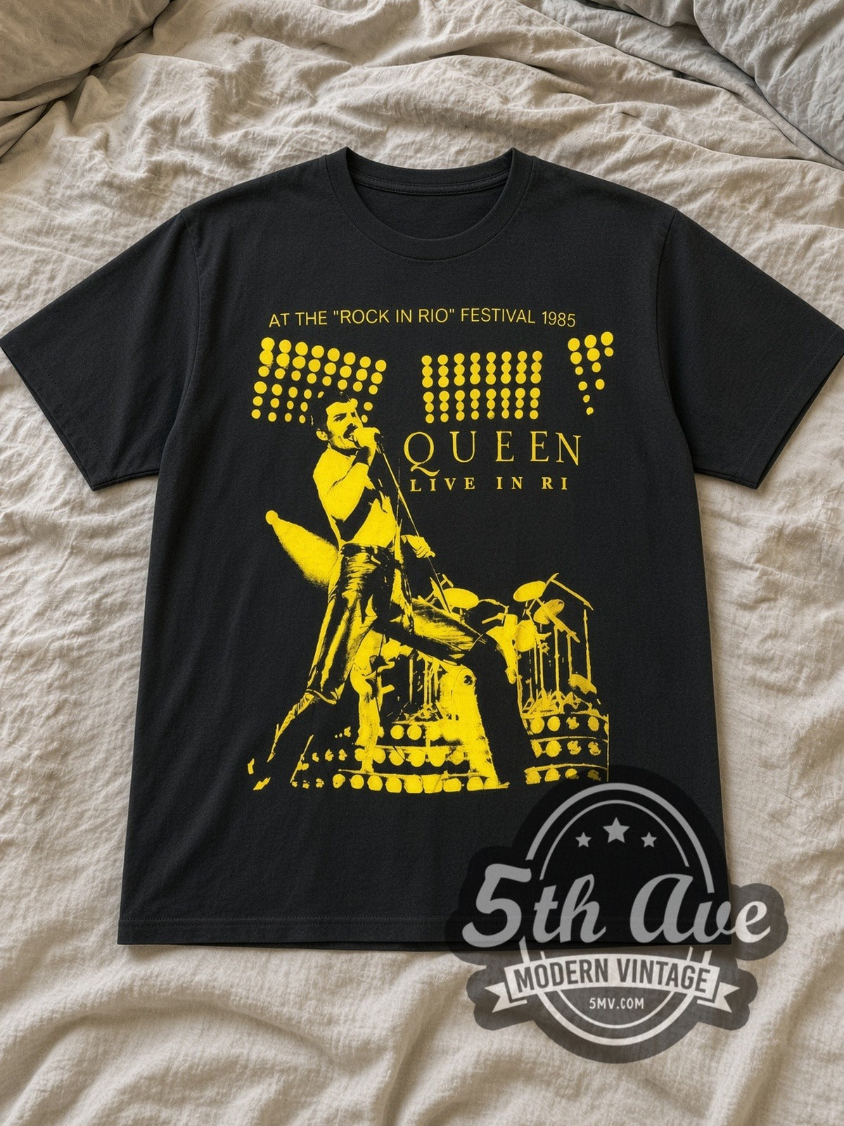 Black Queen Live in Rio / Rock in Rio Festival 1985 Vintage Band T-Shirt laid flat on a linen bed