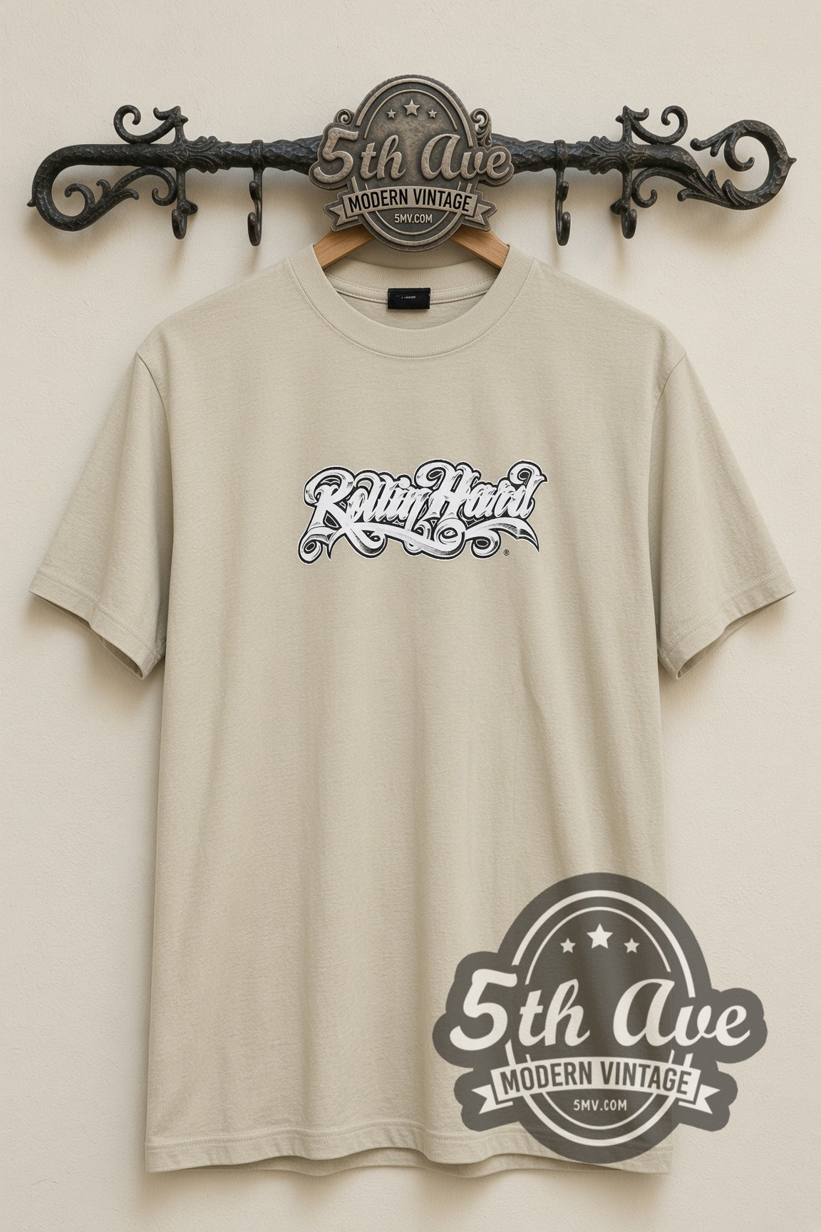 Rollin Hard Golden Impala Lowrider vintage graphic tee, back view on a display rack