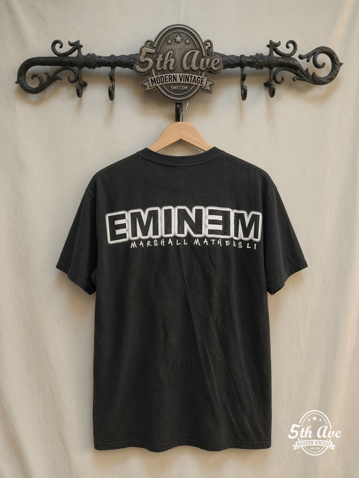 Eminem – The Marshall Mathers LP "EMINƎM" – Vintage Band T-Shirt — back on locked cream ornate 5th Ave rack