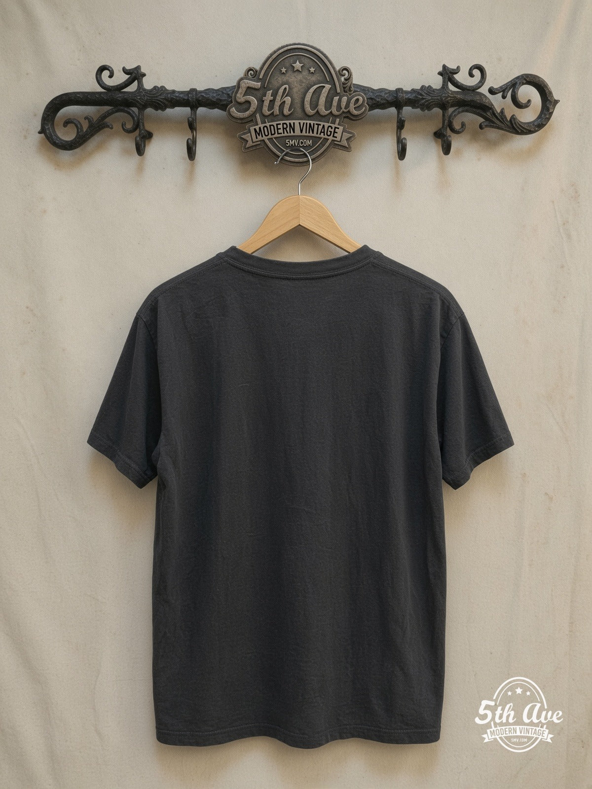 Metallica – World Tour Hand-Screened Cotton – Vintage Band T-Shirt — back on locked cream ornate 5th Ave rack