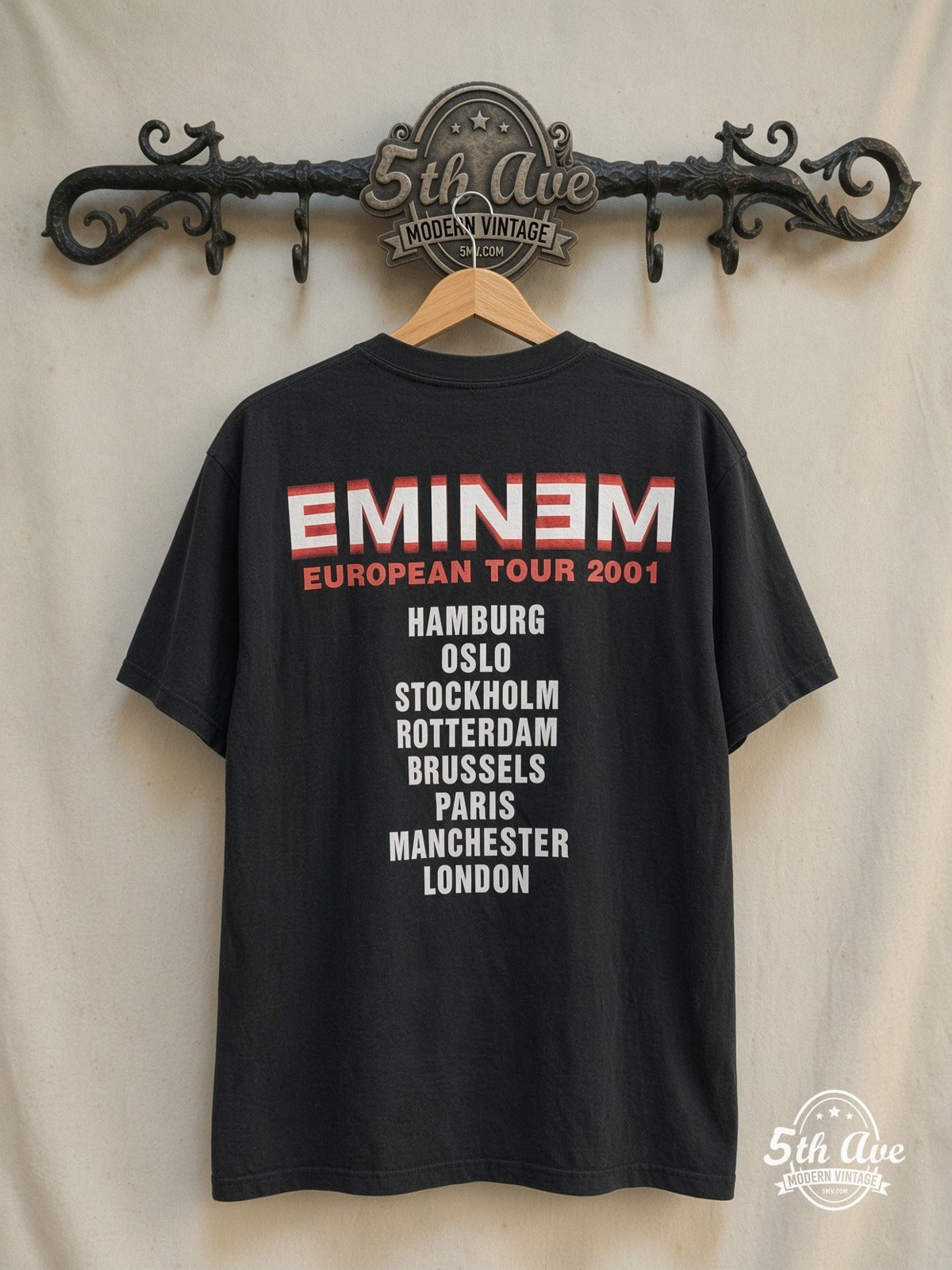 Eminem – Anger Management Tour [European Tour 2001] "EMINƎM – Vintage Band T-Shirt — back on locked cream ornate 5th Ave rack