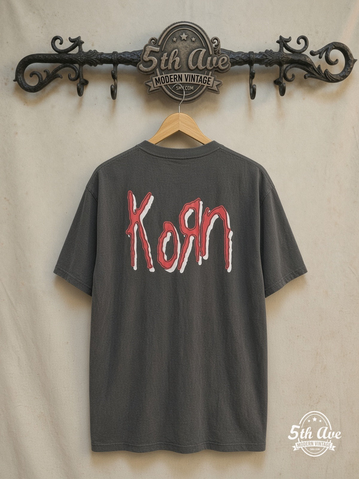 Korn – The Serenity of Suffering – Vintage Band T-Shirt — back on locked cream ornate 5th Ave rack
