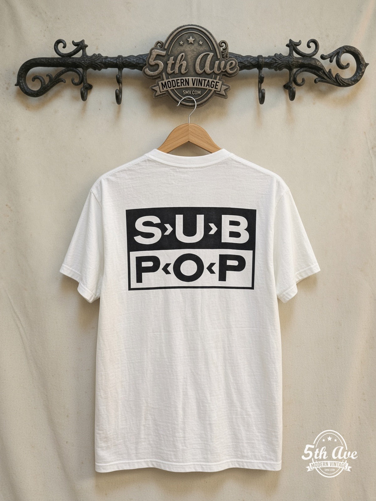 Nirvana – Bleach Sub Pop Records – Vintage Band T-Shirt — back on locked cream ornate 5th Ave rack