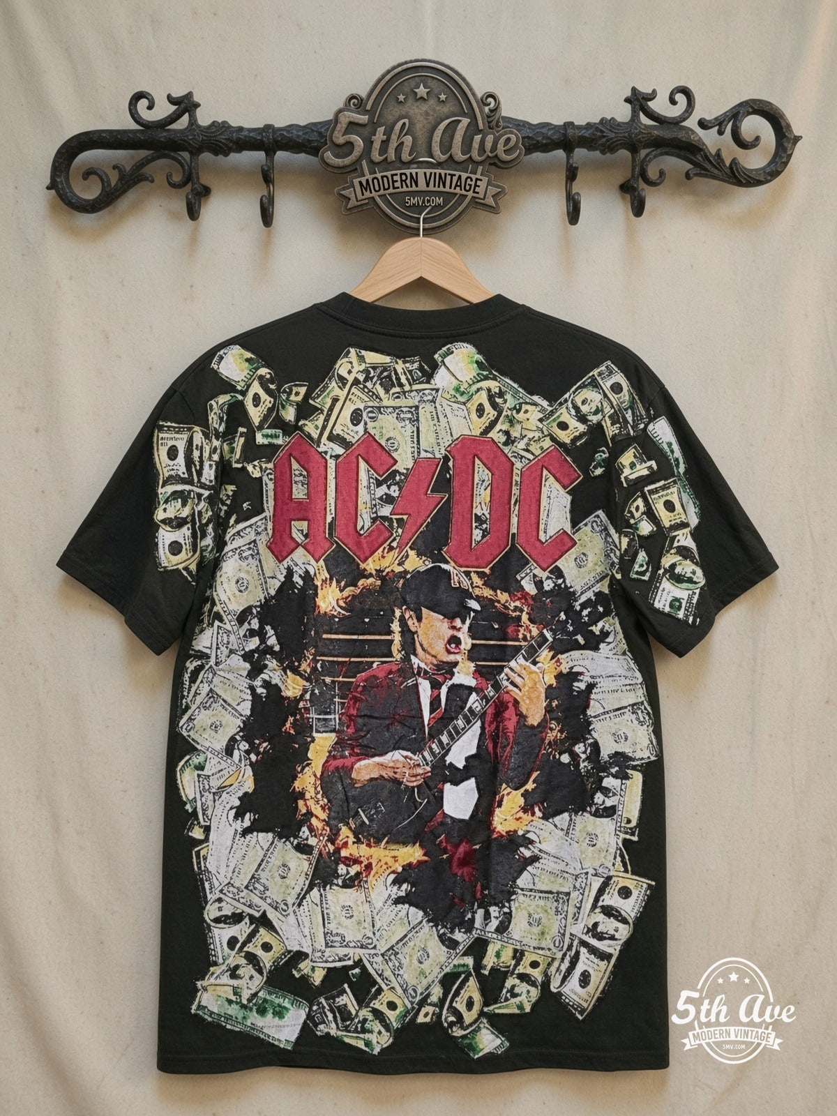 AC/DC – s Angus Young Shreds in All-Over Print Tee – Vintage Band T-Shirt — back on locked cream ornate 5th Ave rack