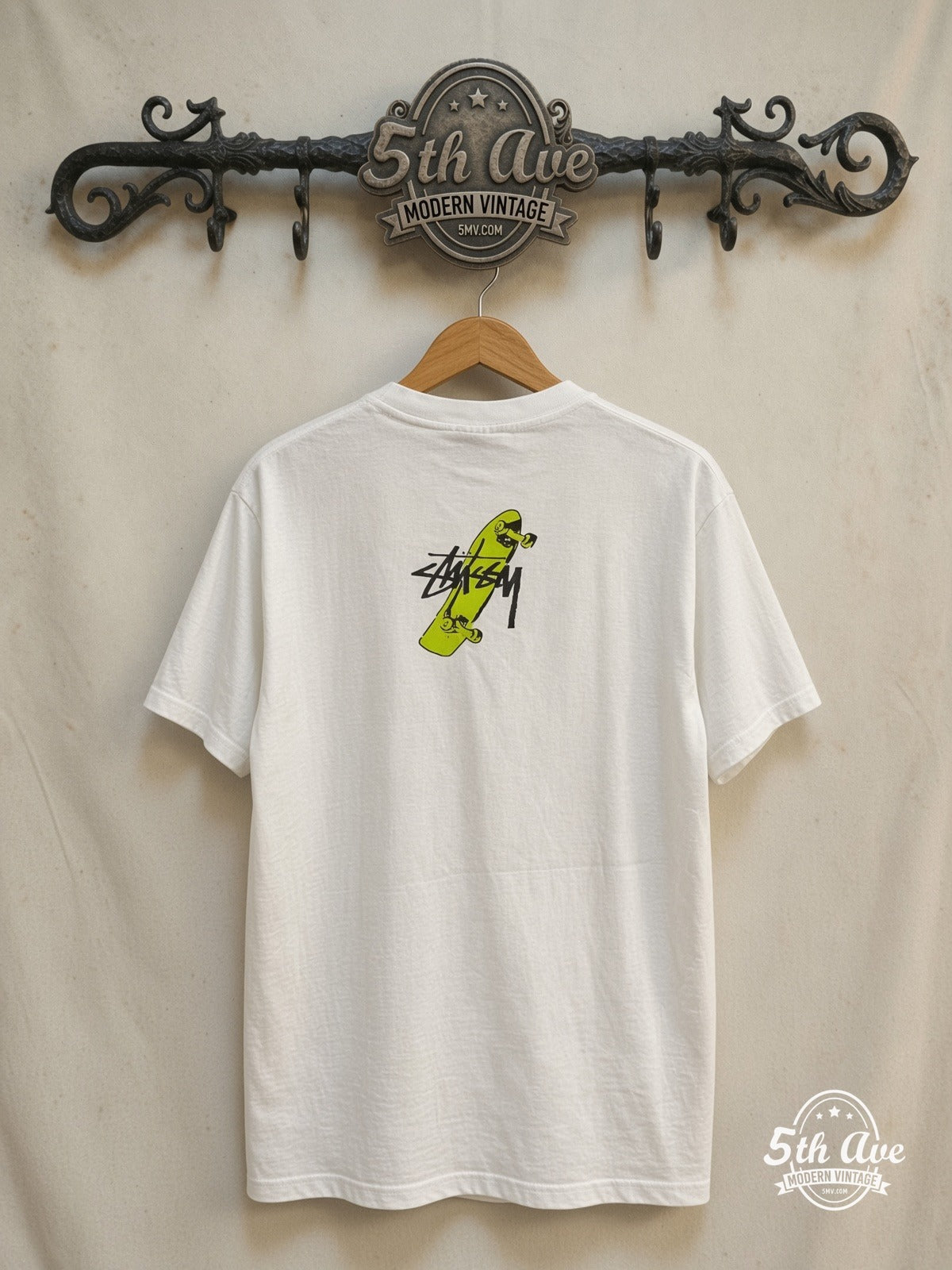 Stussy – Toyoda Tokyo Homeboy – Vintage Graphic Tee — back on locked cream ornate 5th Ave rack