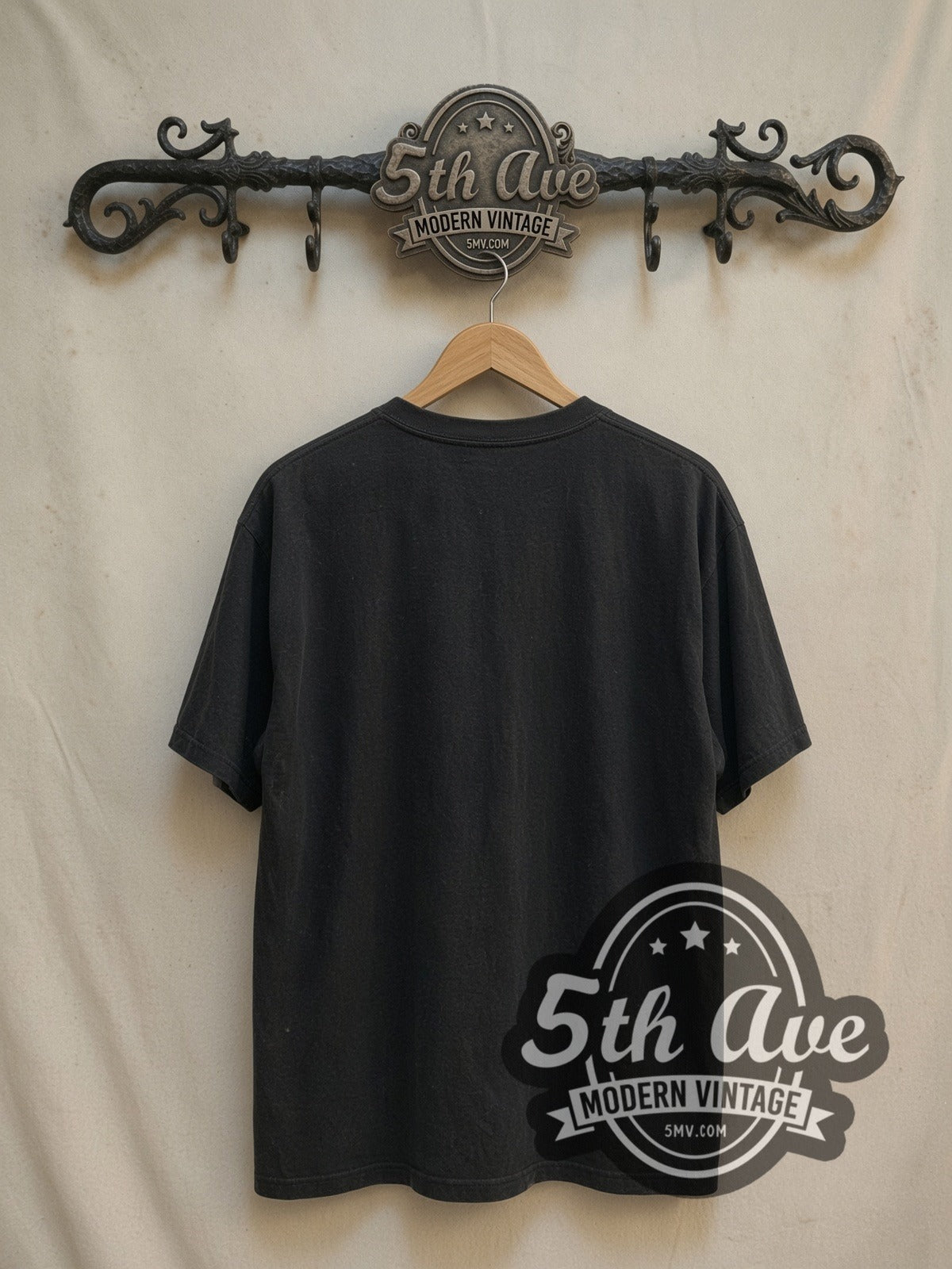 Kill Bill Movie Poster vintage graphic t-shirt, back view on a display rack