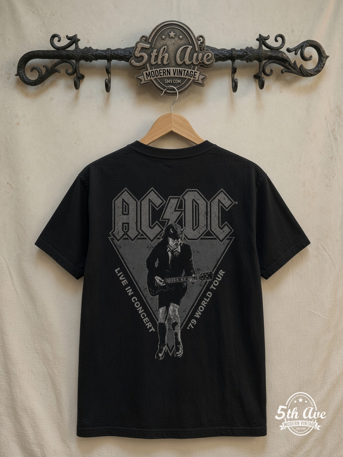 AC/DC – Live in Concert '79 World Tour – Vintage Band T-Shirt — back on locked cream ornate 5th Ave rack