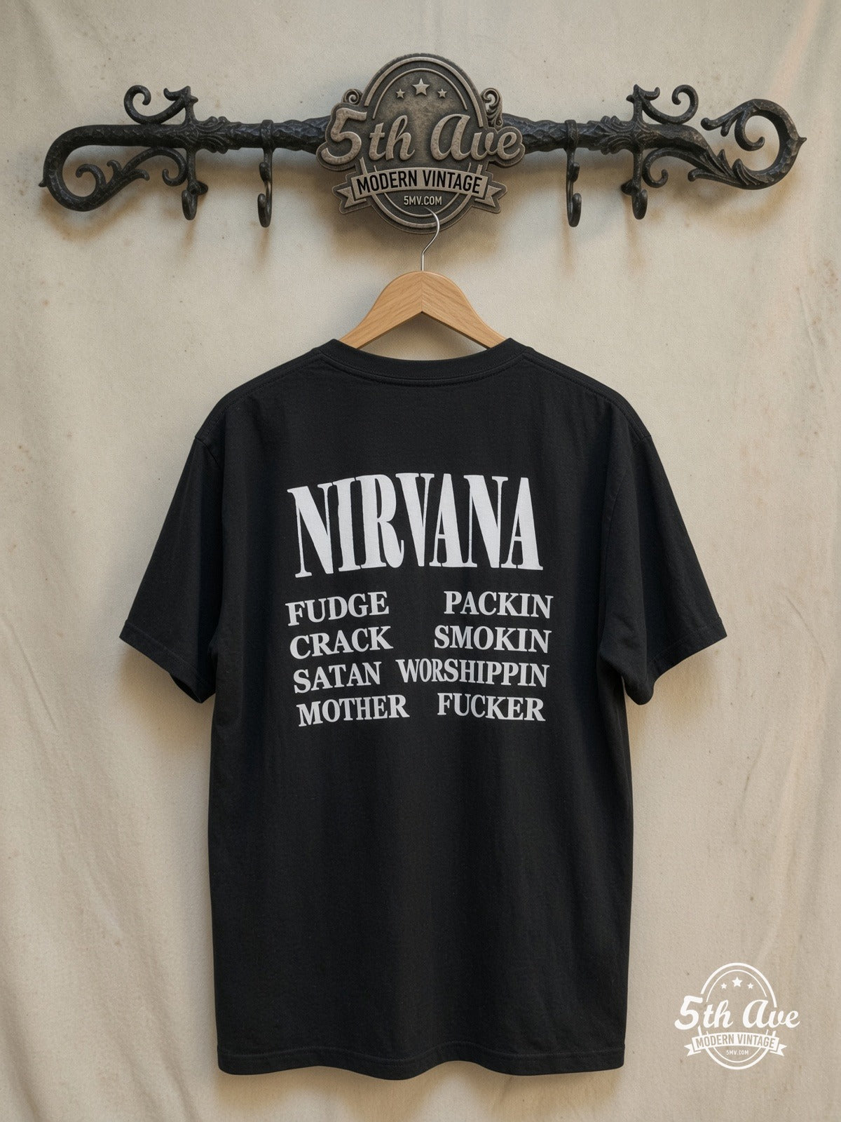 Nirvana – Grunge Is Dead – All Over Print – Vintage Band T-Shirt — back on locked cream ornate 5th Ave rack