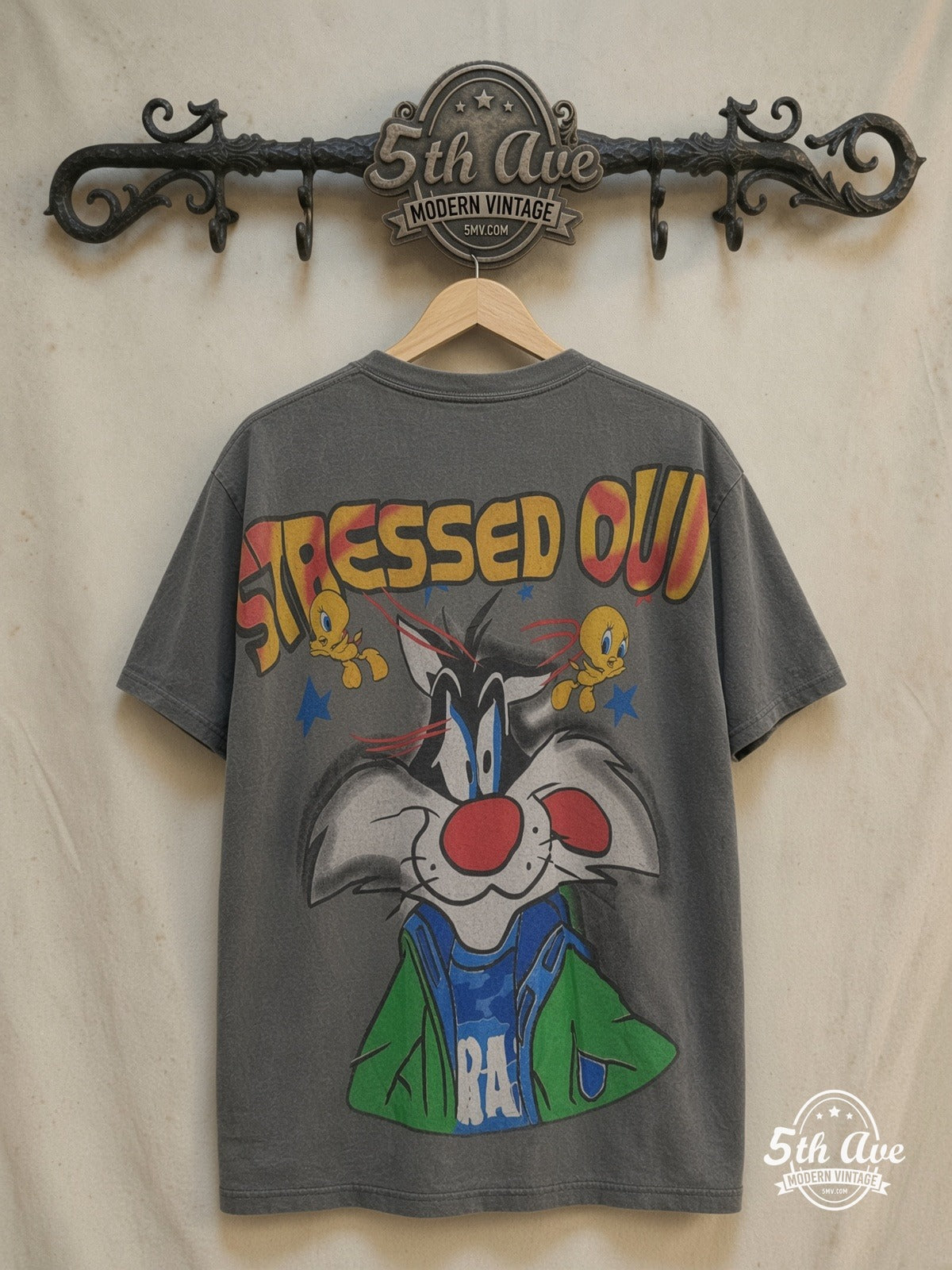 Looney Tunes – Sylvester and Tweety Stressed Out – All Over Print – New Vintage Graphic Tee — back on locked cream ornate 5th Ave rack